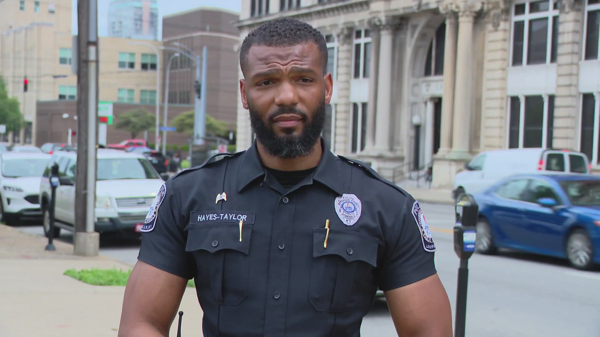 Before LMPD officers were able to get to the scene, Jefferson County Public Schools (JCPS) Officer Kevin Hayes-Taylor drove past the incident and sprung into action.