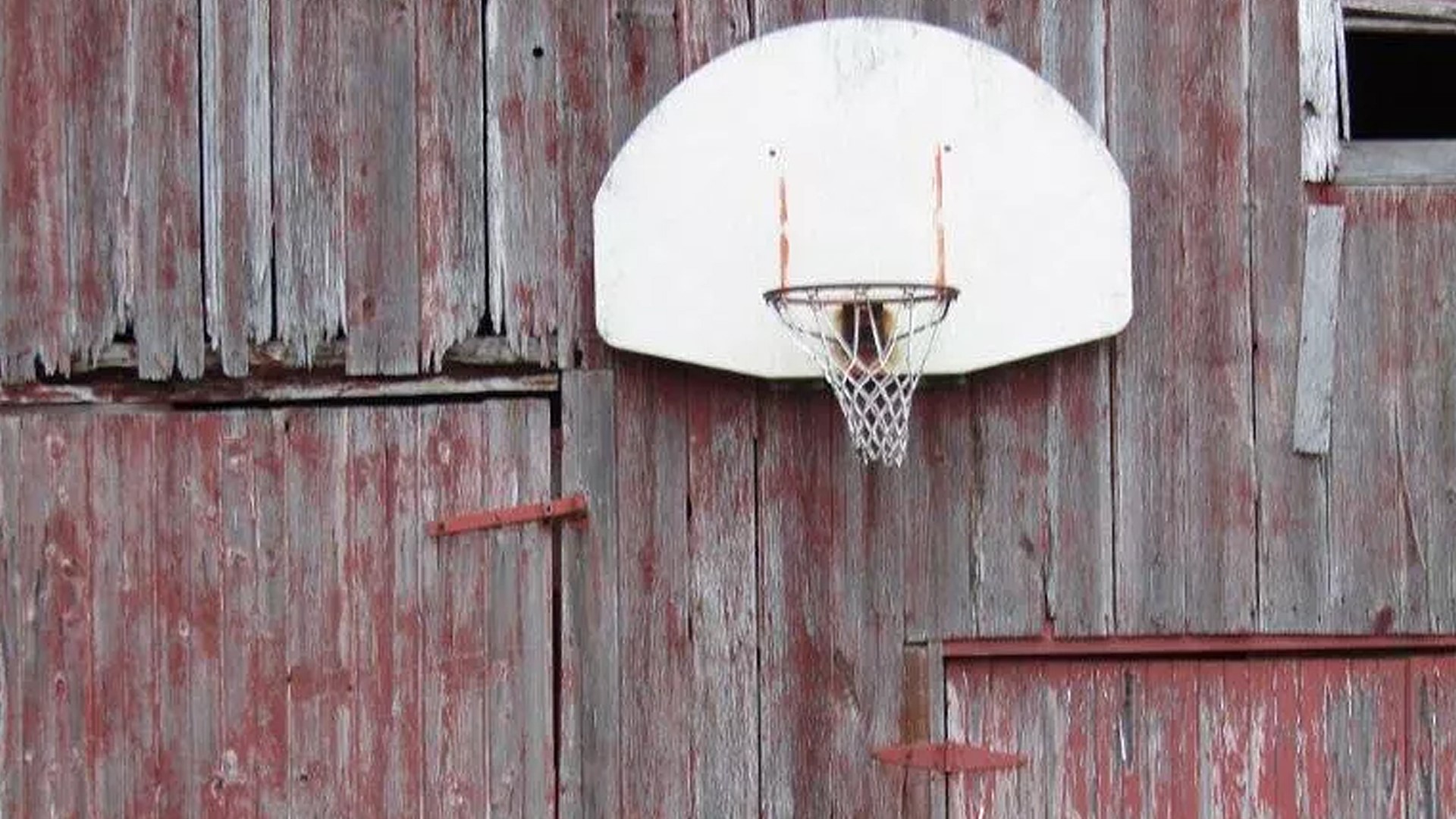 An old barn, a basketball rim, a father, two kids. An Indiana story ...