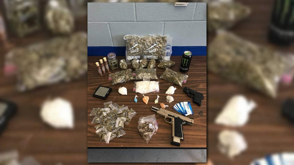 2 charged after drugs, weapons found in Louisville home