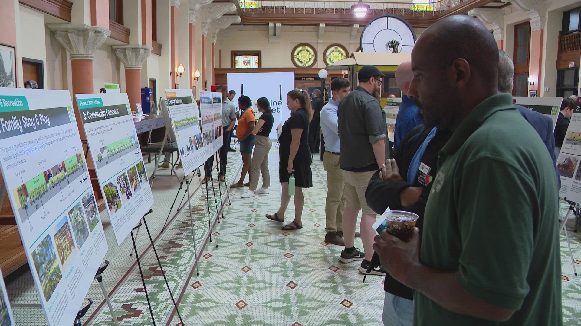 For years, the wide corridor has acted as a barrier between downtown and west Louisville.