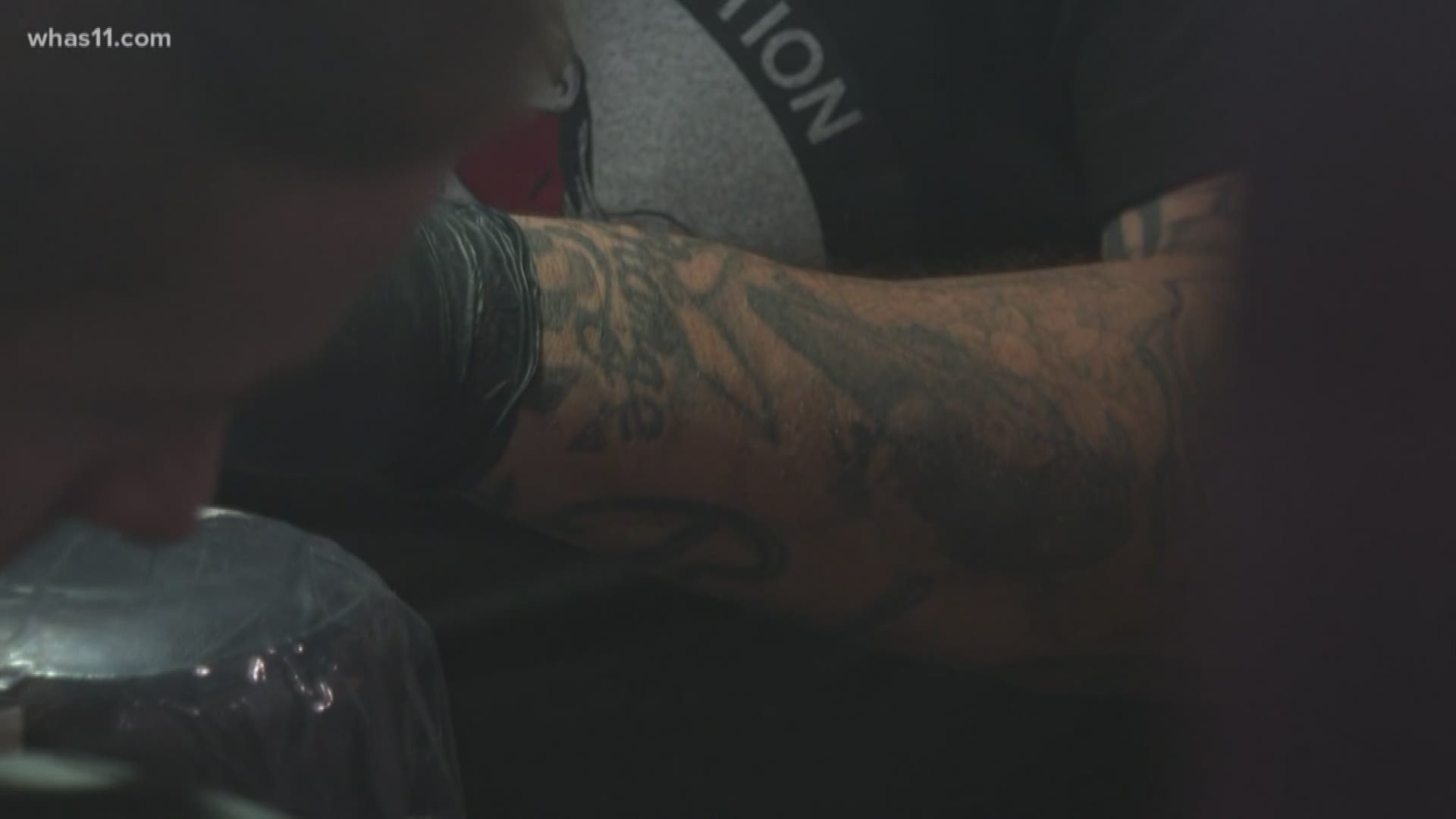 After a proposed ban on tattoos over scarred skin caused an uproar, Kentucky health officials offered community members a seat at the table to listen to what they have to say.