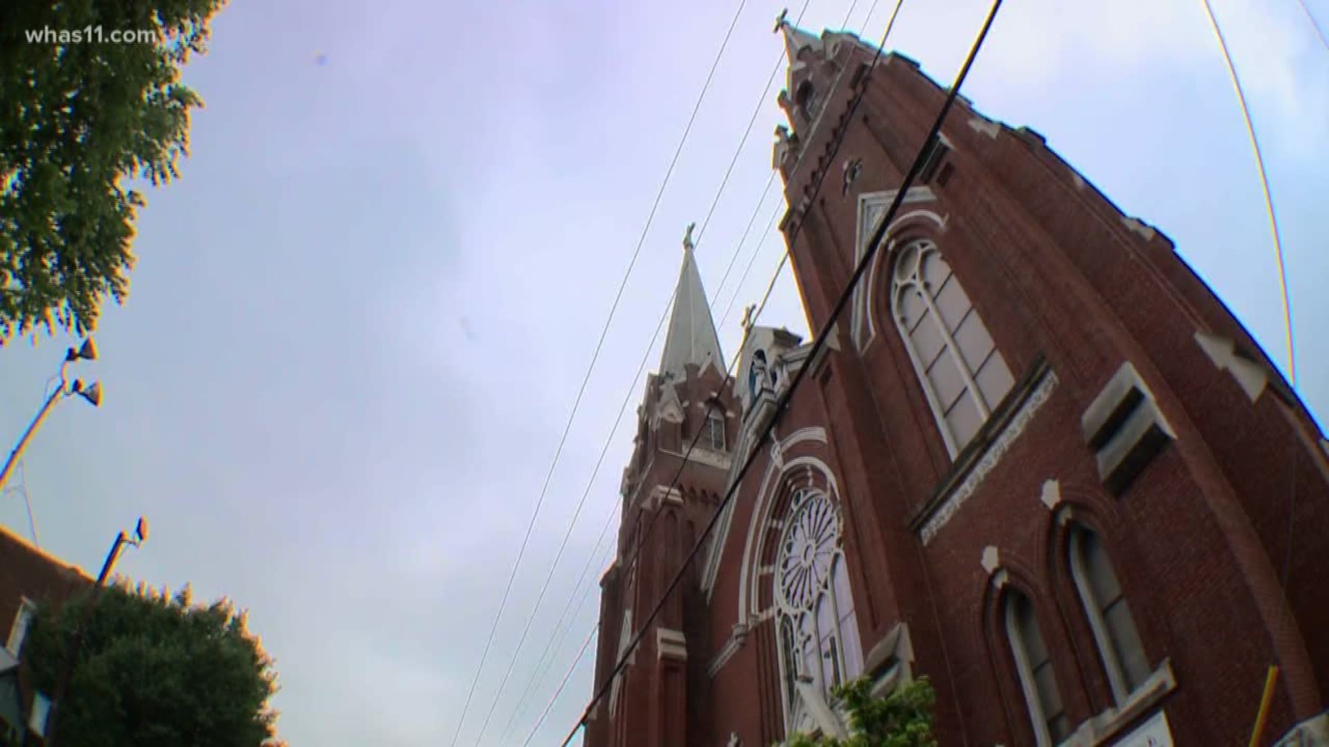 Father David Sanchez is taking a hike of a lifetime in an effort to save the steeples at St. Joseph's Church.