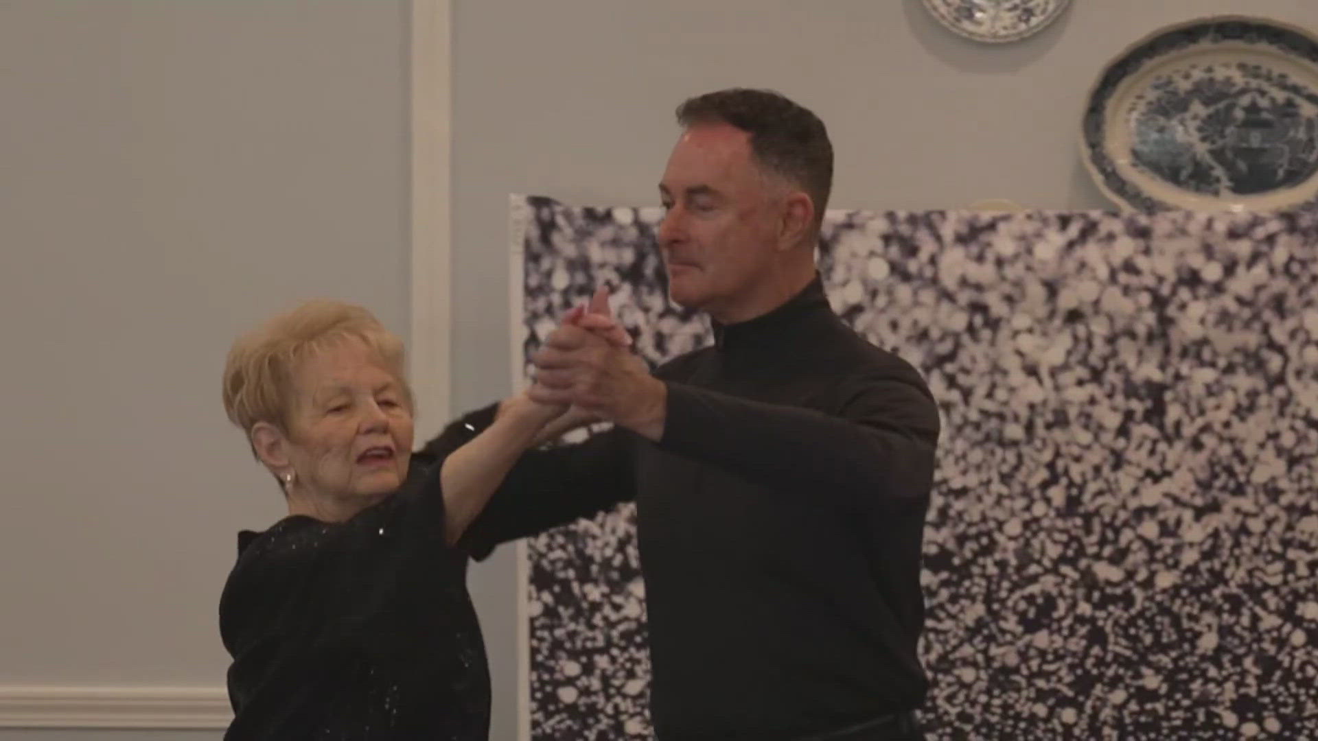 Resident Rose Brady brought staff and residents of the Grand Retirement Community together Monday.