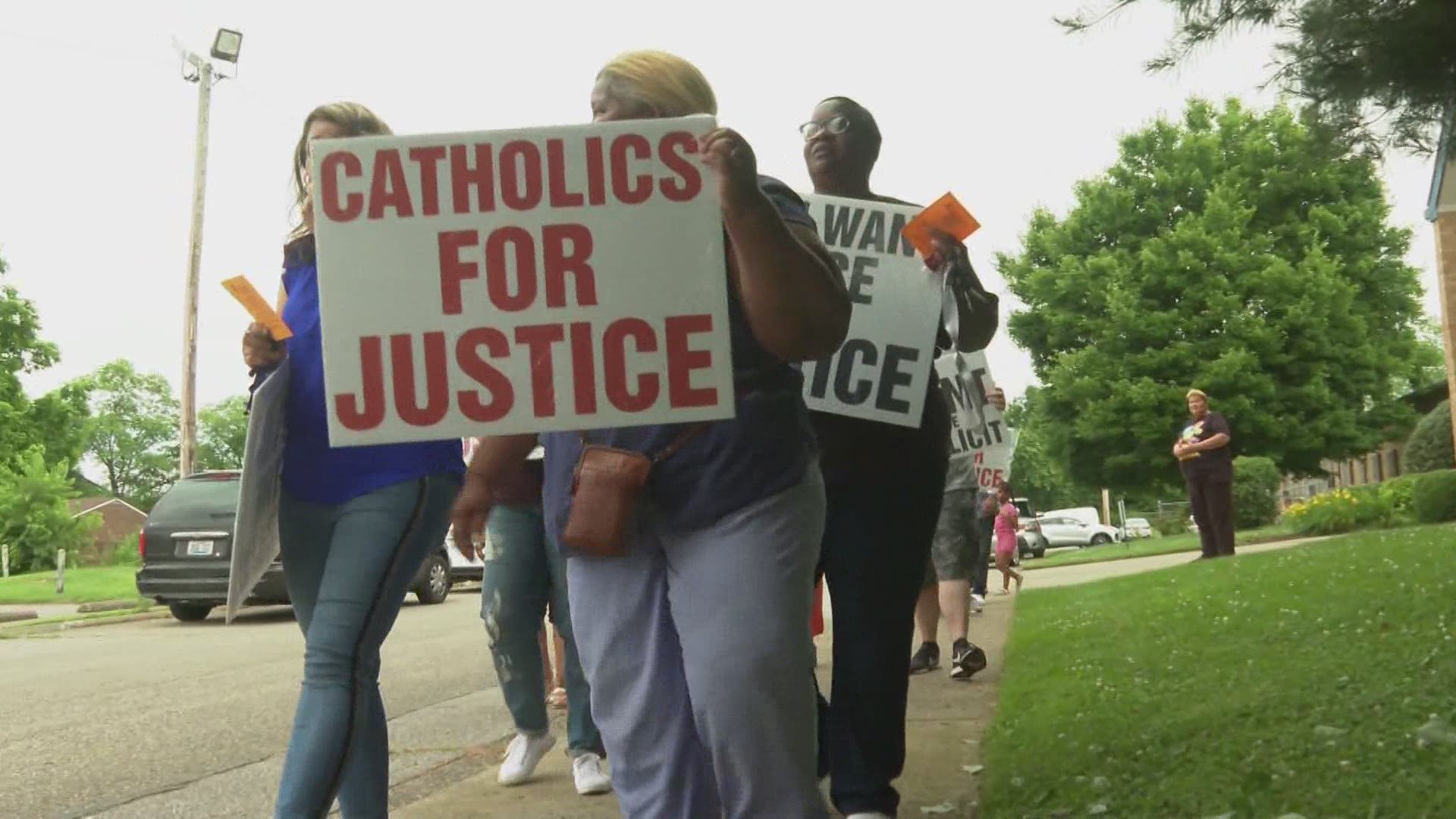 Immaculate Heart of Mary parishioners say they want their priest, Christopher Rhodes, to be removed.