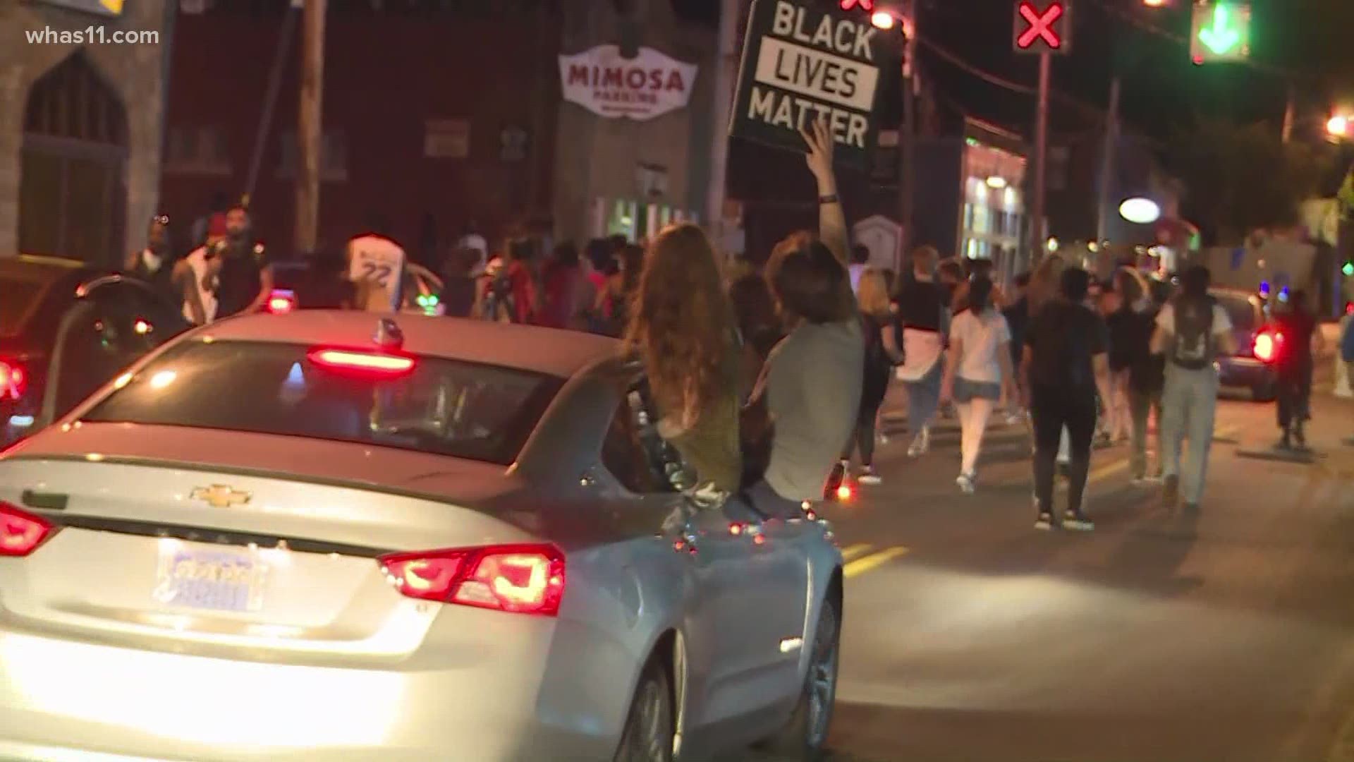 In Louisville's second week of protests calling for justice in Breonna Taylor's death, protesters walk from downtown through the Highlands.