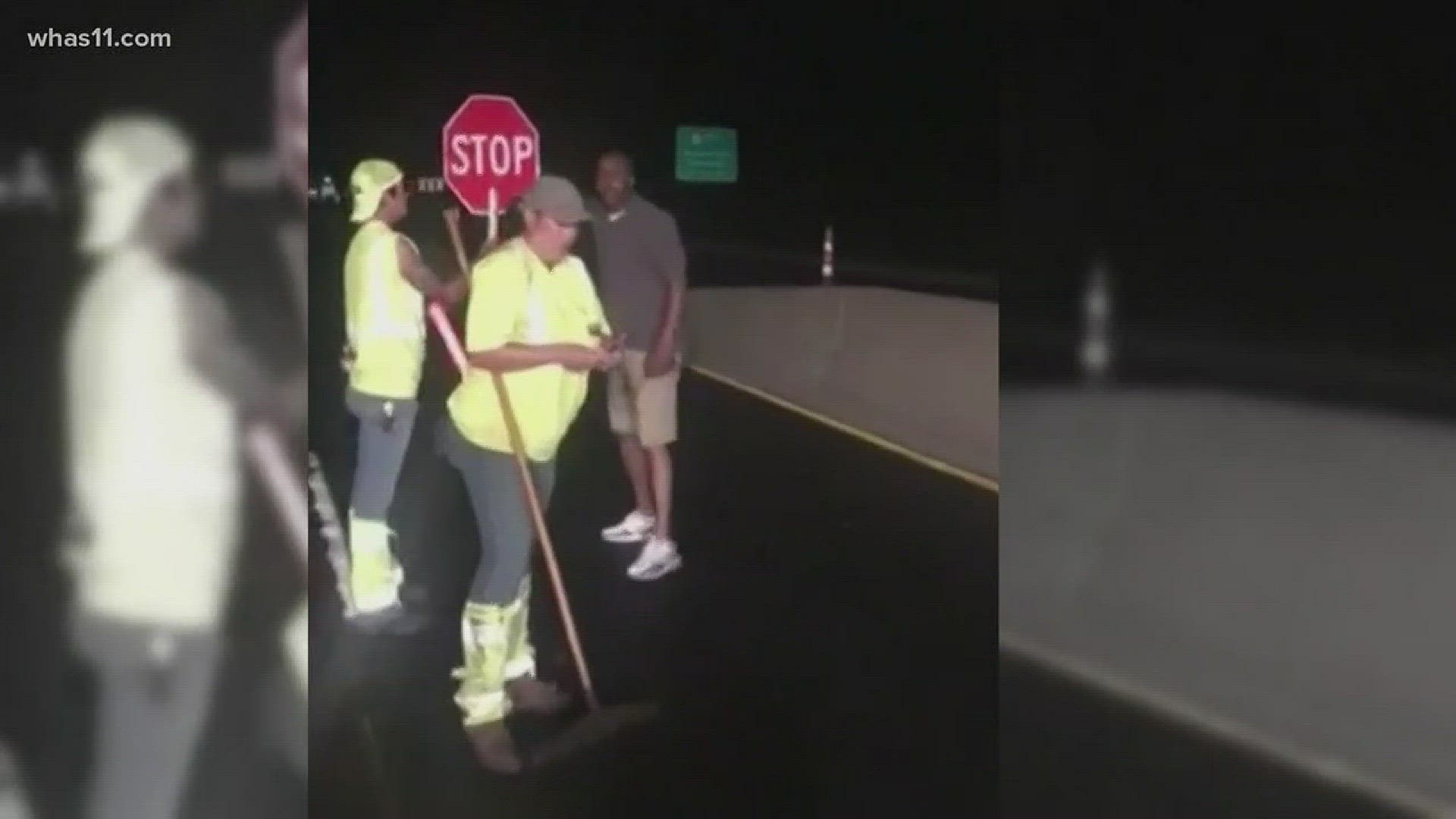 In the viral video, the trooper ends up being pinned to the ground by a construction crew