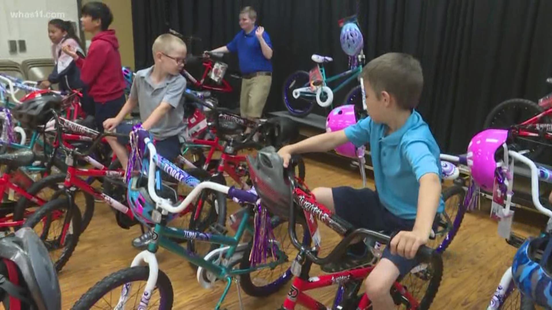 Coral Ridge Elementary students surprised with free bicycles | whas11.com