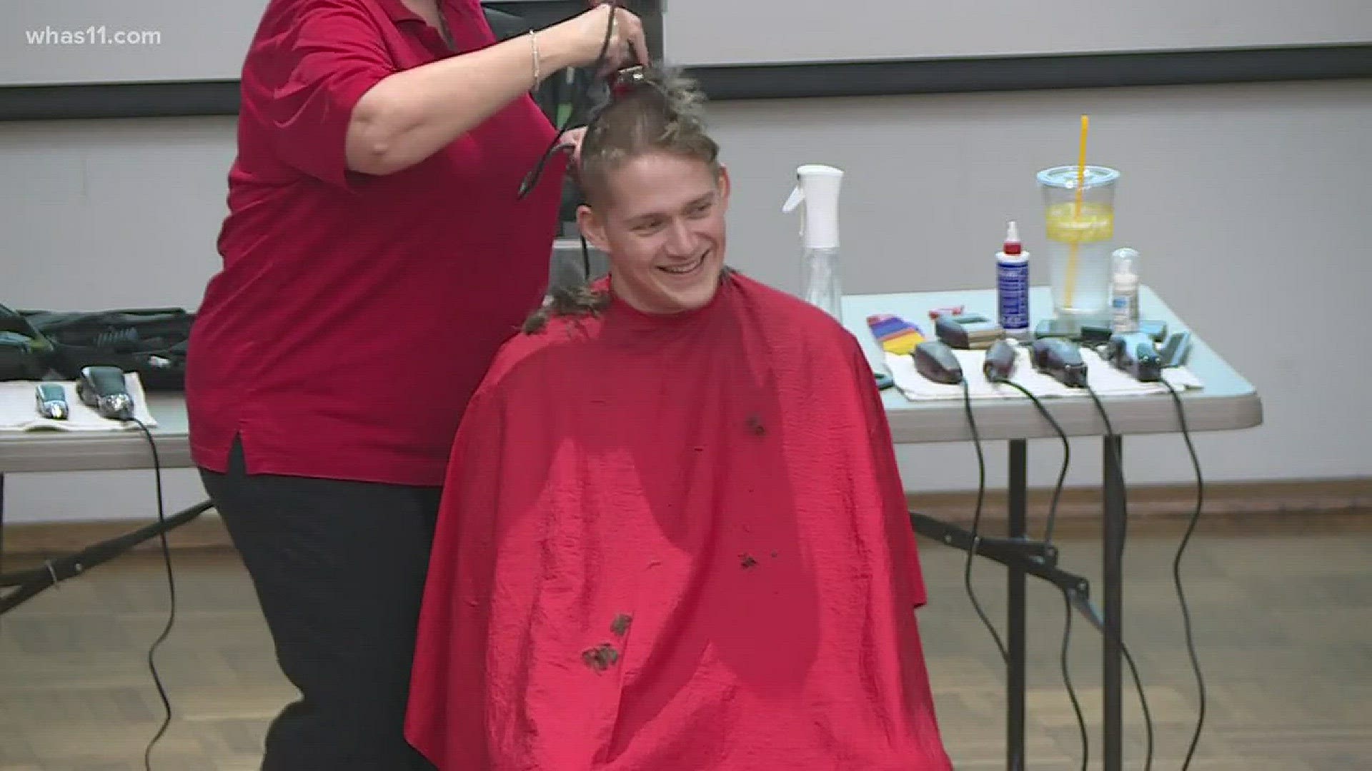 Students at UofL shaving their heads today to support cancer research.