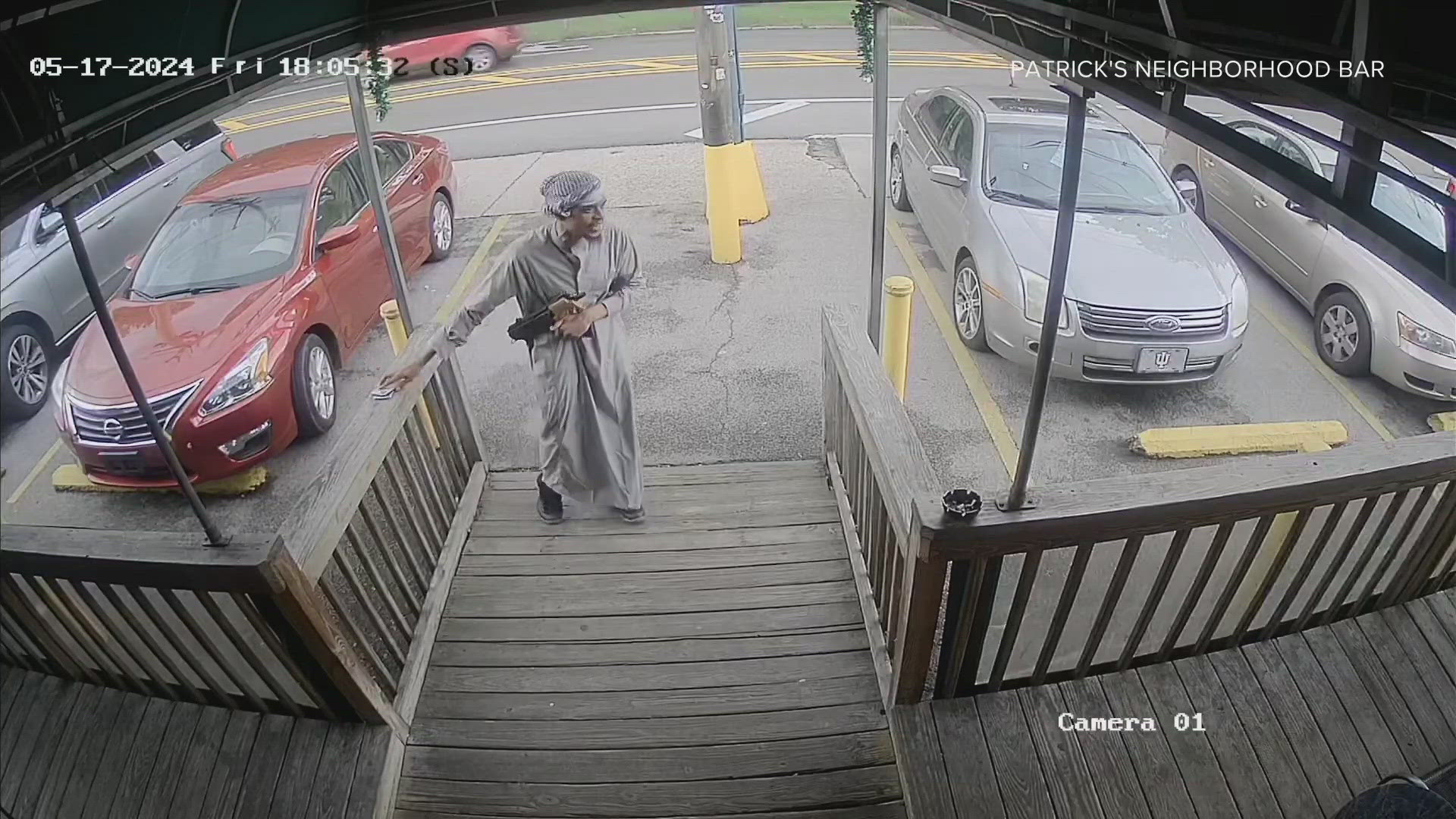 Surveillance video also showed the man, 27-year-old Arik Brooks, walking around Frankfort Avenue with an assault rifle.