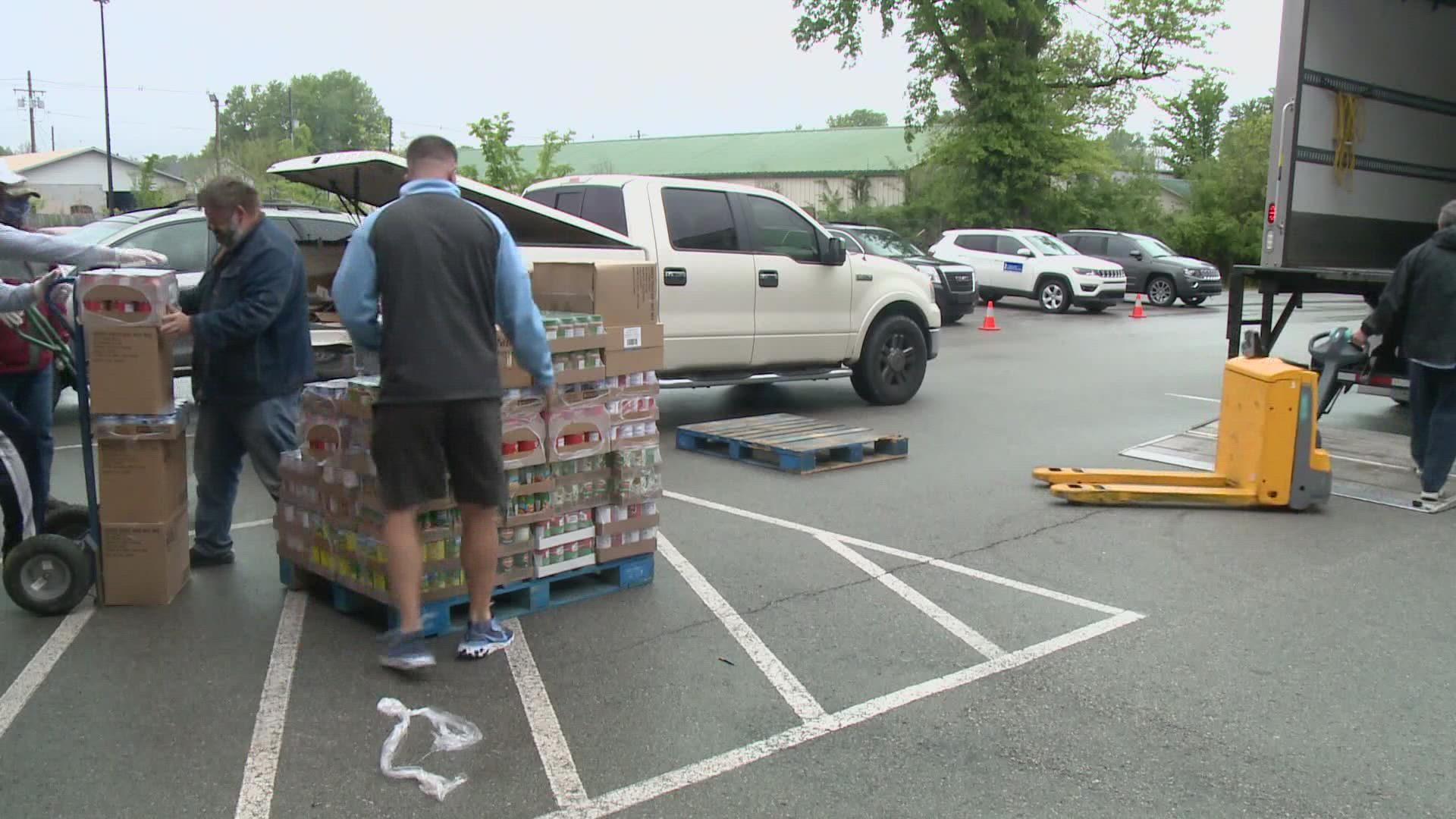 The company has partnered with Louisville's 'Dare to Care' to deliver thousands of pounds of food to help fight hunger.