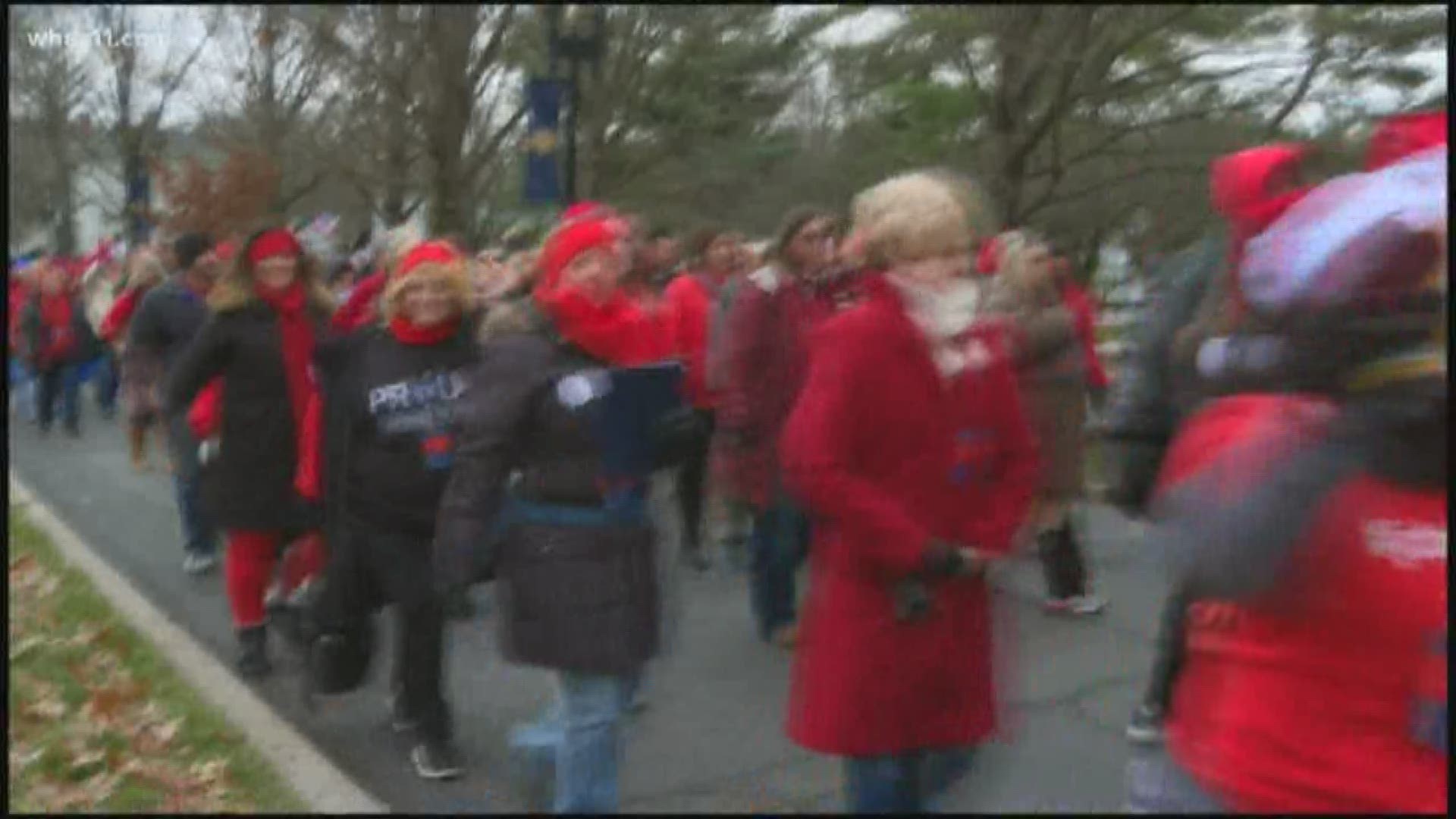 Teachers lined the street and led the parade as part of the new governors inauguration
