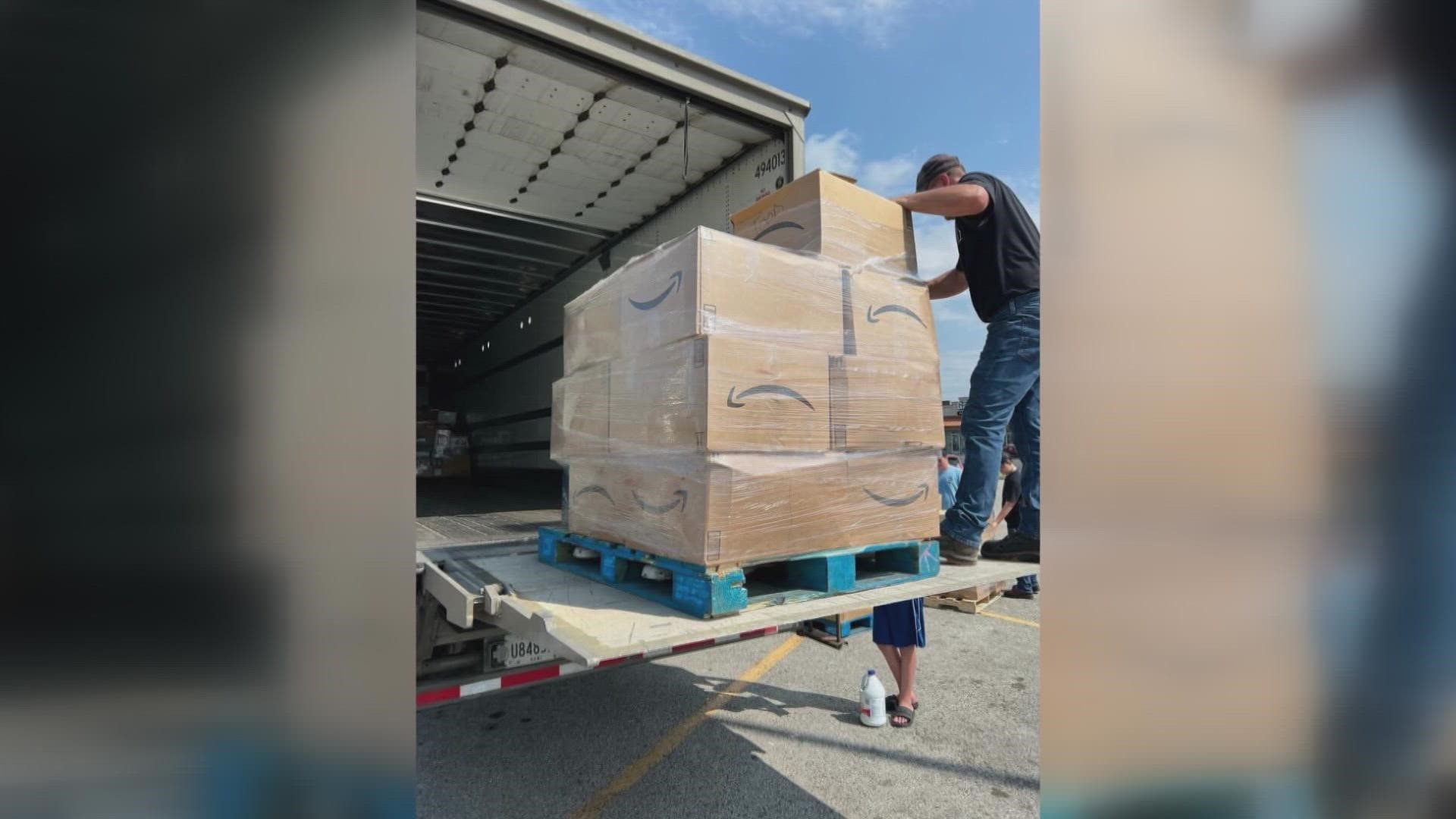 Volunteers from the sheriff's office and the high school football team collected more than 30,000 pounds of donated supplies for eastern Kentucky.