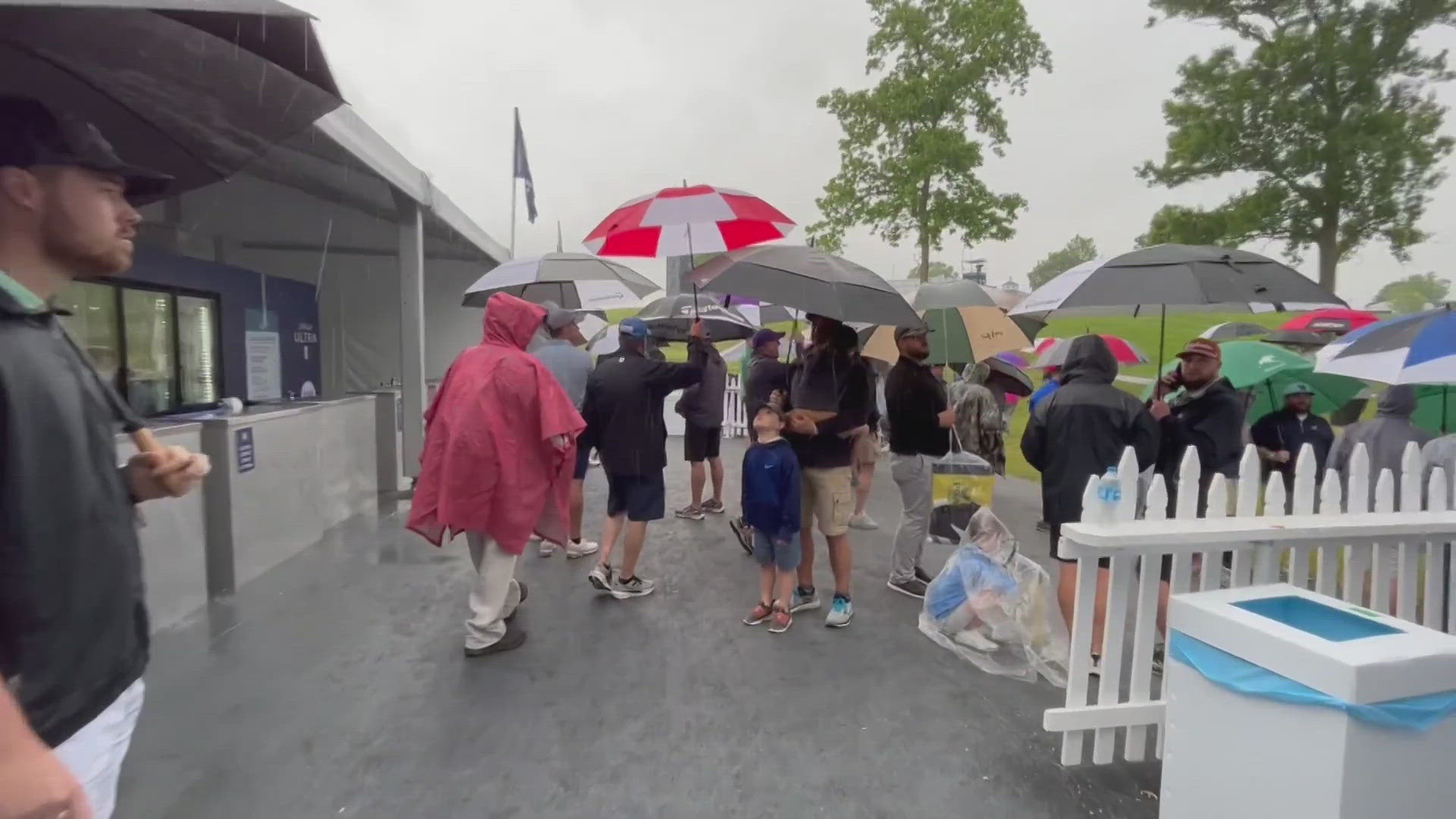 Fans were ordered to take cover at Valhalla Golf Club due to rainy conditions.