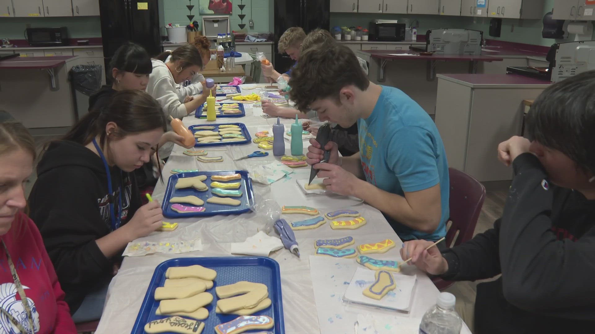 Christian Academy students baked over 400 cookies which they will give to students in their providence school for World Down Syndrome Day.