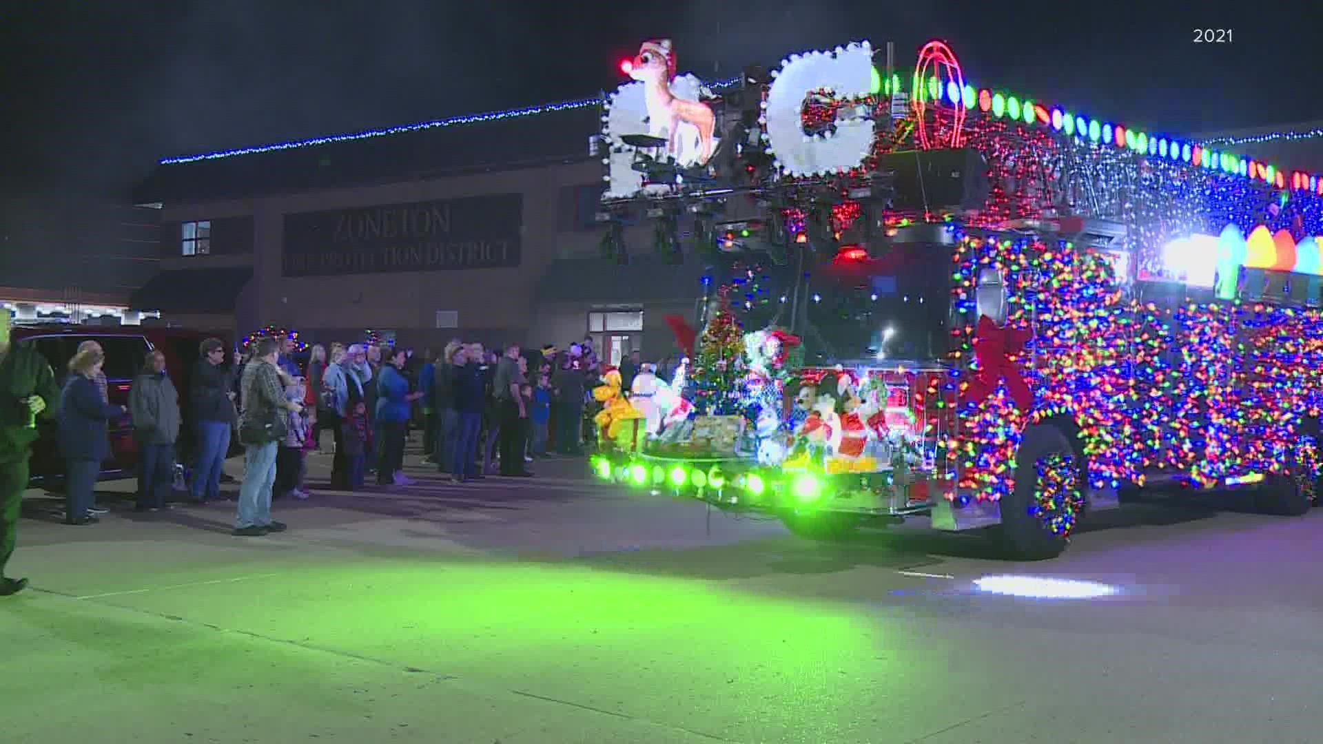 It took two weeks and 80,000 lights to transform this ladder truck into Santa's sleigh.
