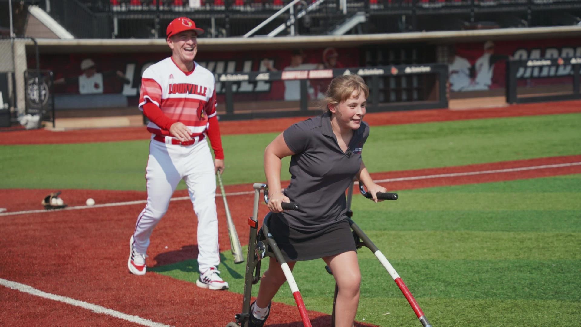 Kosair Charities wrote on a Facebook post that you can see coach Dan McDonnell's excitement when Hallie smashed a ball and raced to first while laughing.