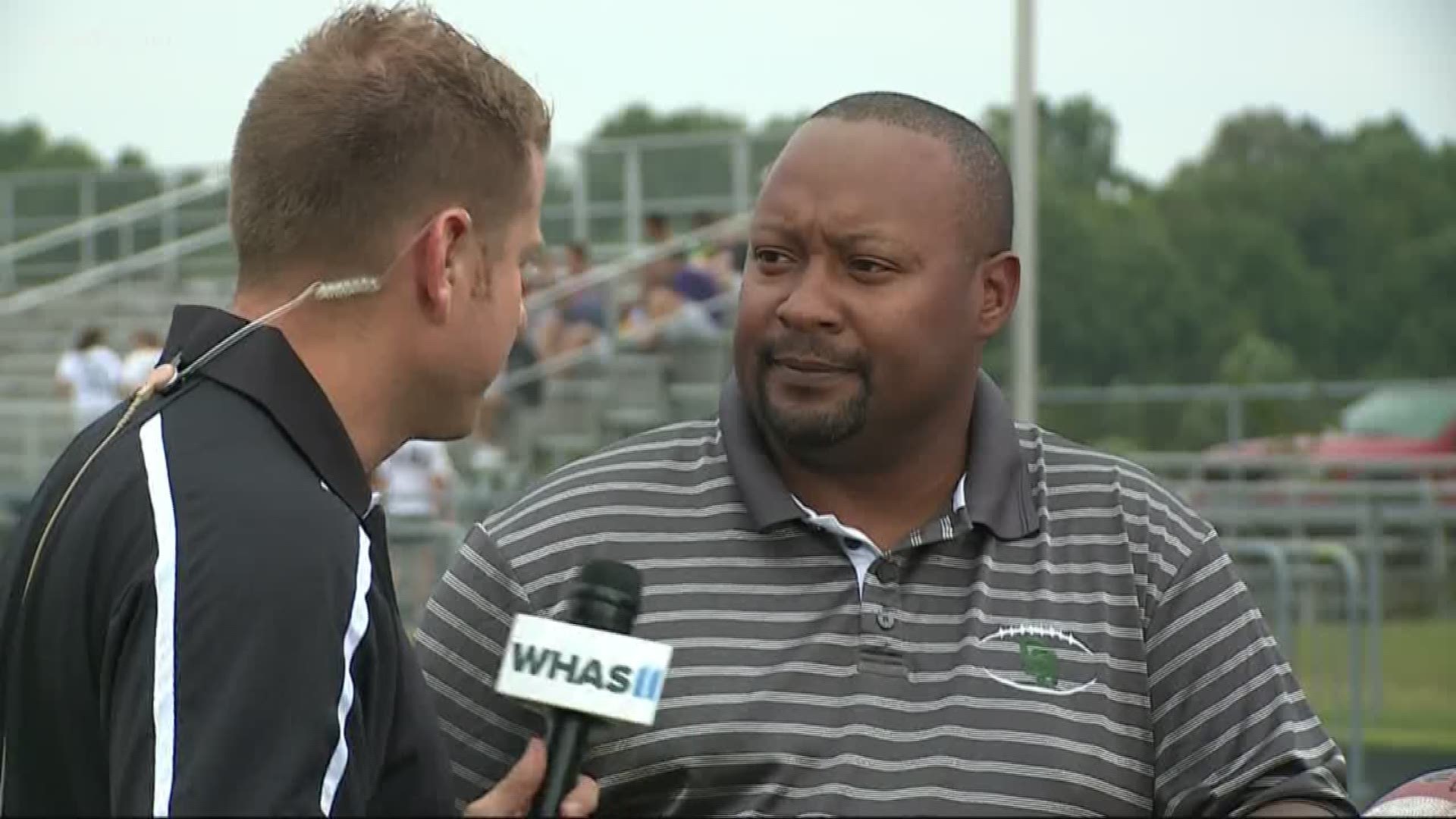 Kent talks with South Oldham football coach at HS GameTime