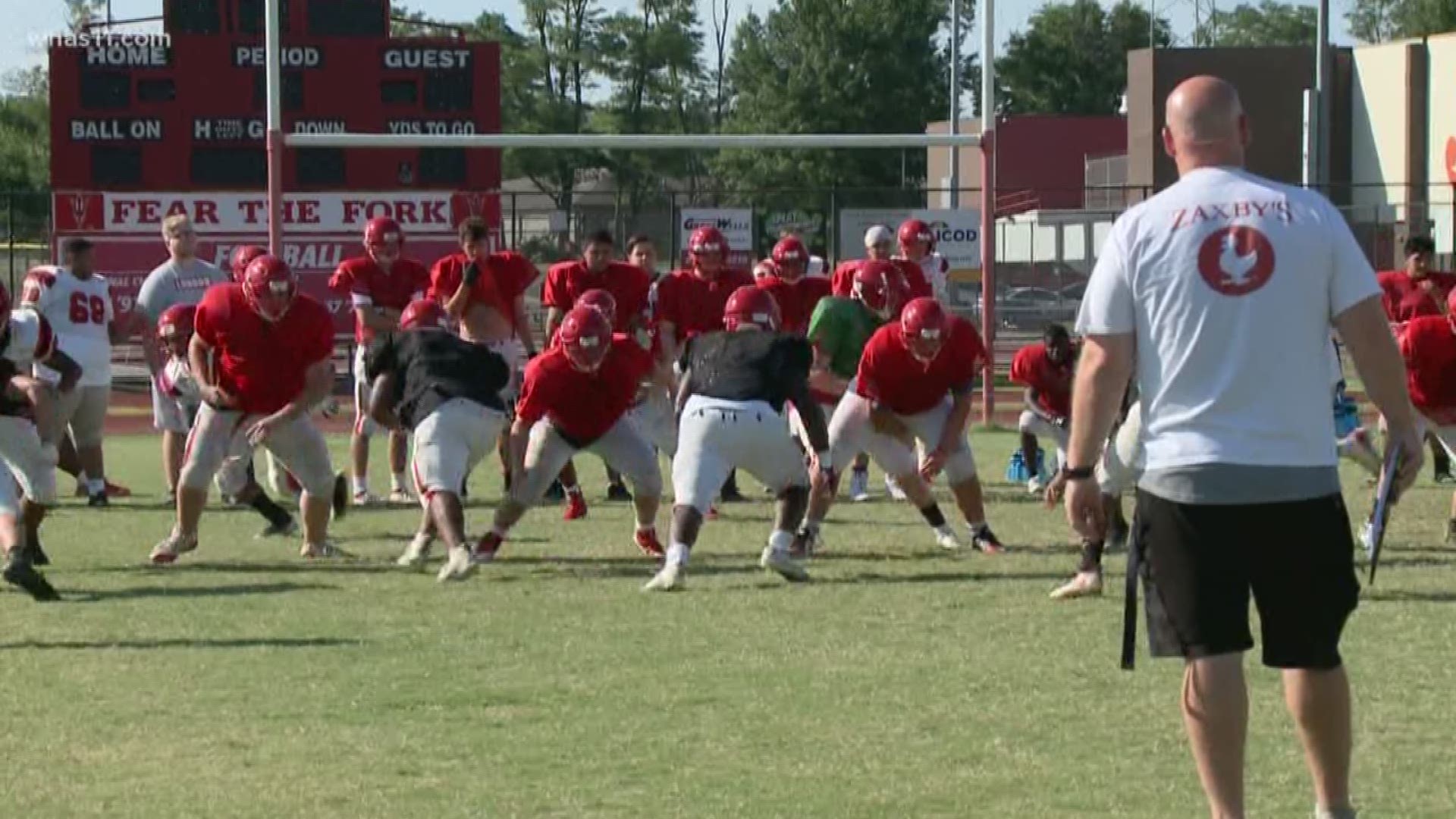 A new coach is bringing new determination to his old high school.
