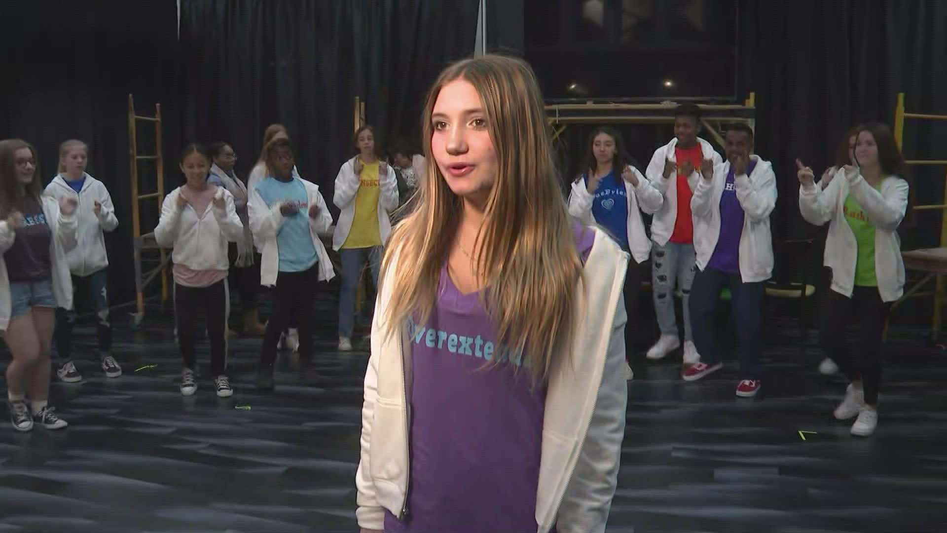 WHAS11's Gabrielle Harmon joins in on the fun as cast members teach her some moves used in the show.