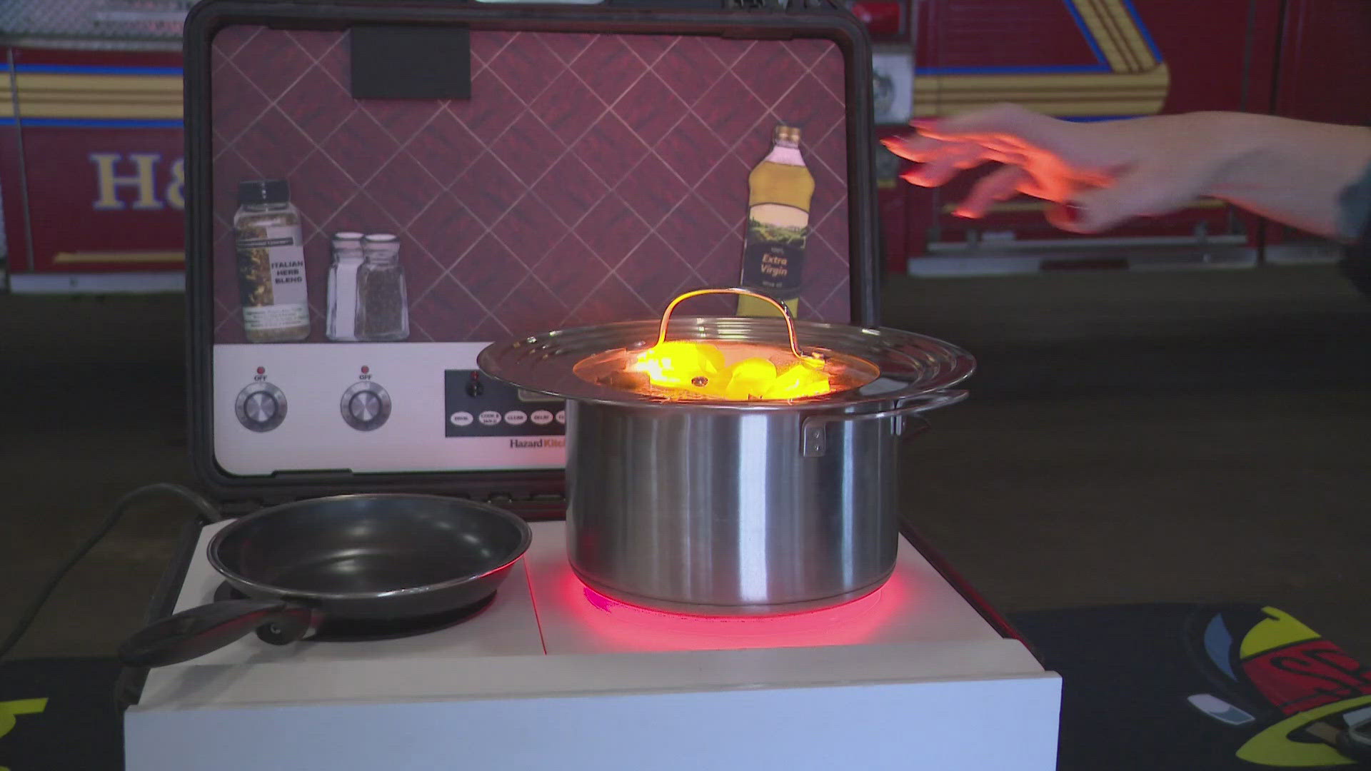 Louisville Fire says you don't even need to use the pot lid to suffocate a fire and any cooking-grade object that can create that seal will do.