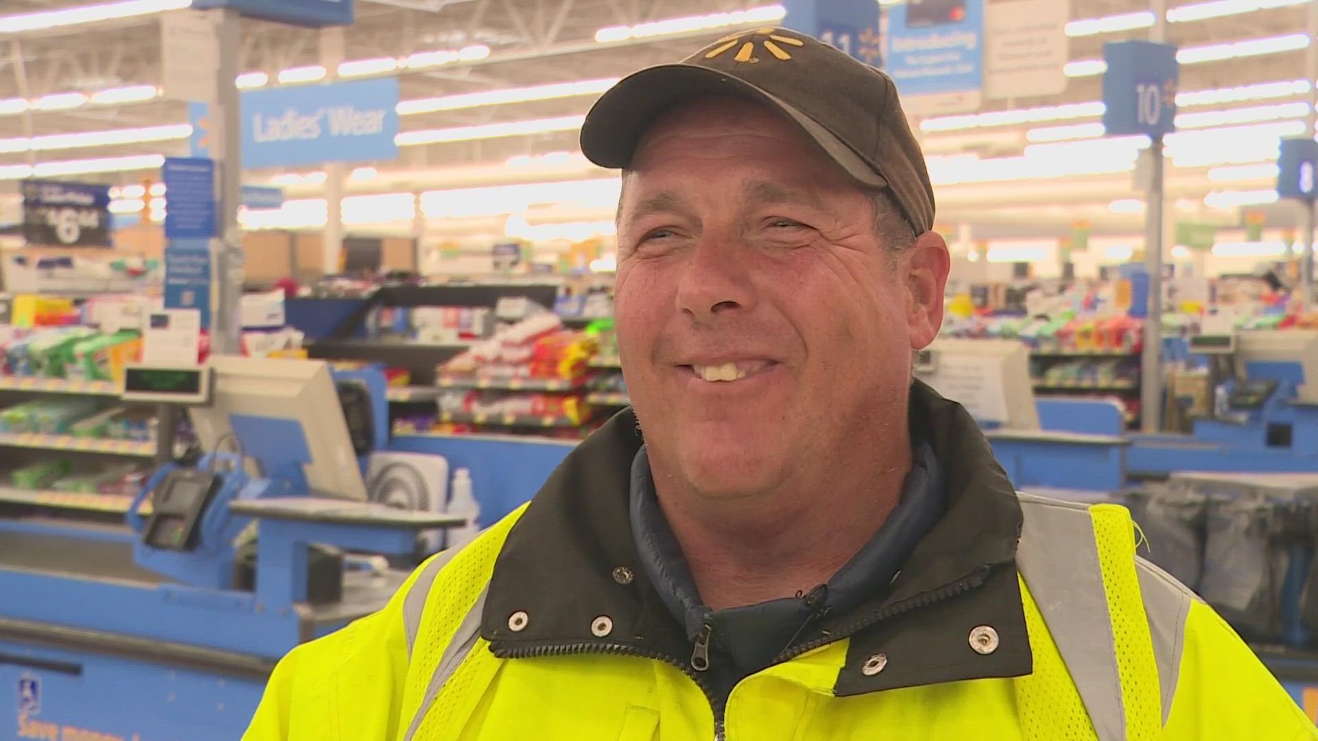 The Walmart employee pushing equal amounts of carts and kindness