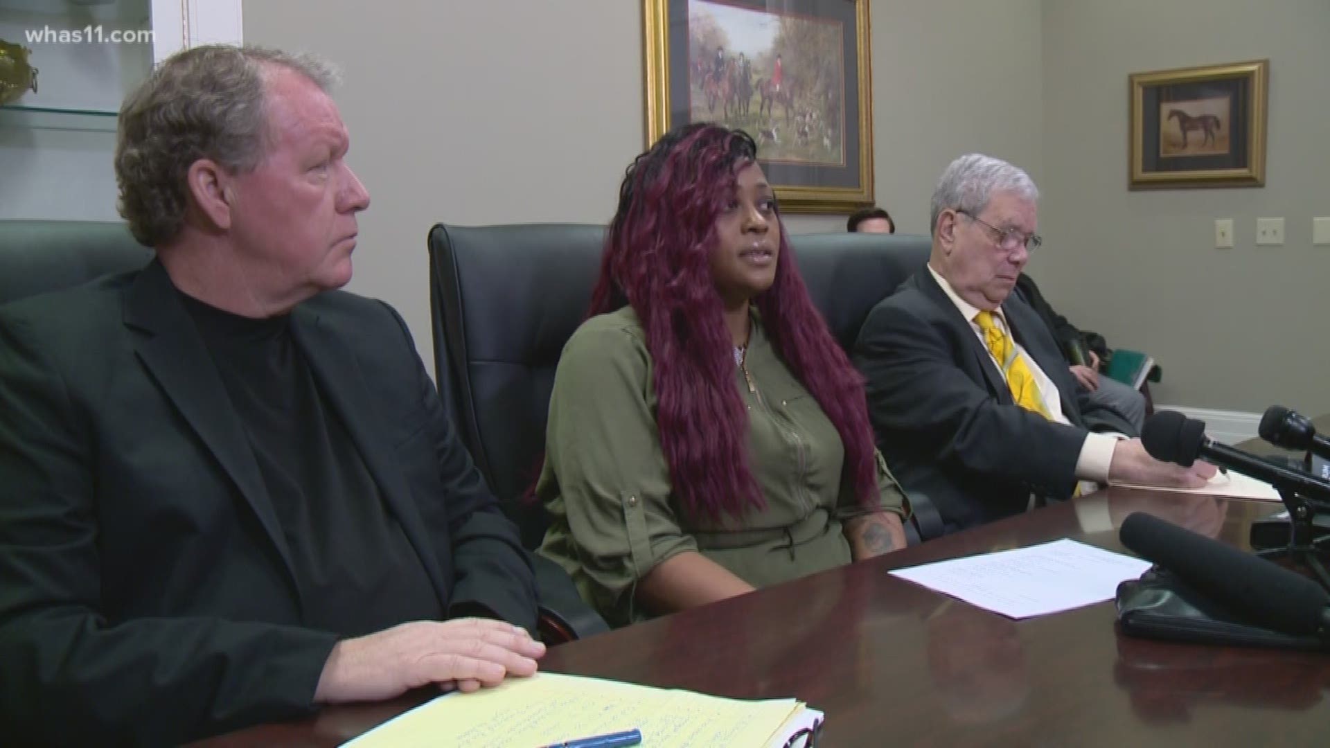 Two JCPS students are back in school after being hit by a car on their way to the bus stop and now their mom is taking the school district to court.