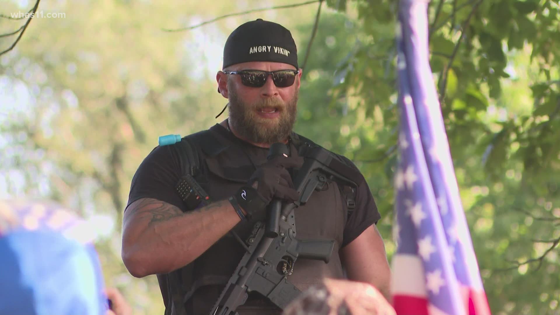 Members of the armed militia patriots marched in downtown Louisville have tense, nonviolent exchange with protesters calling for justice in the Breonna Taylor case