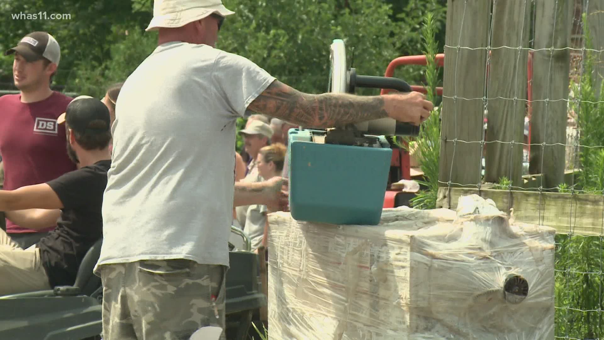 A crowd gathered in Charlestown, Indiana to get their hands on items left at the self-proclaimed animal sanctuary.