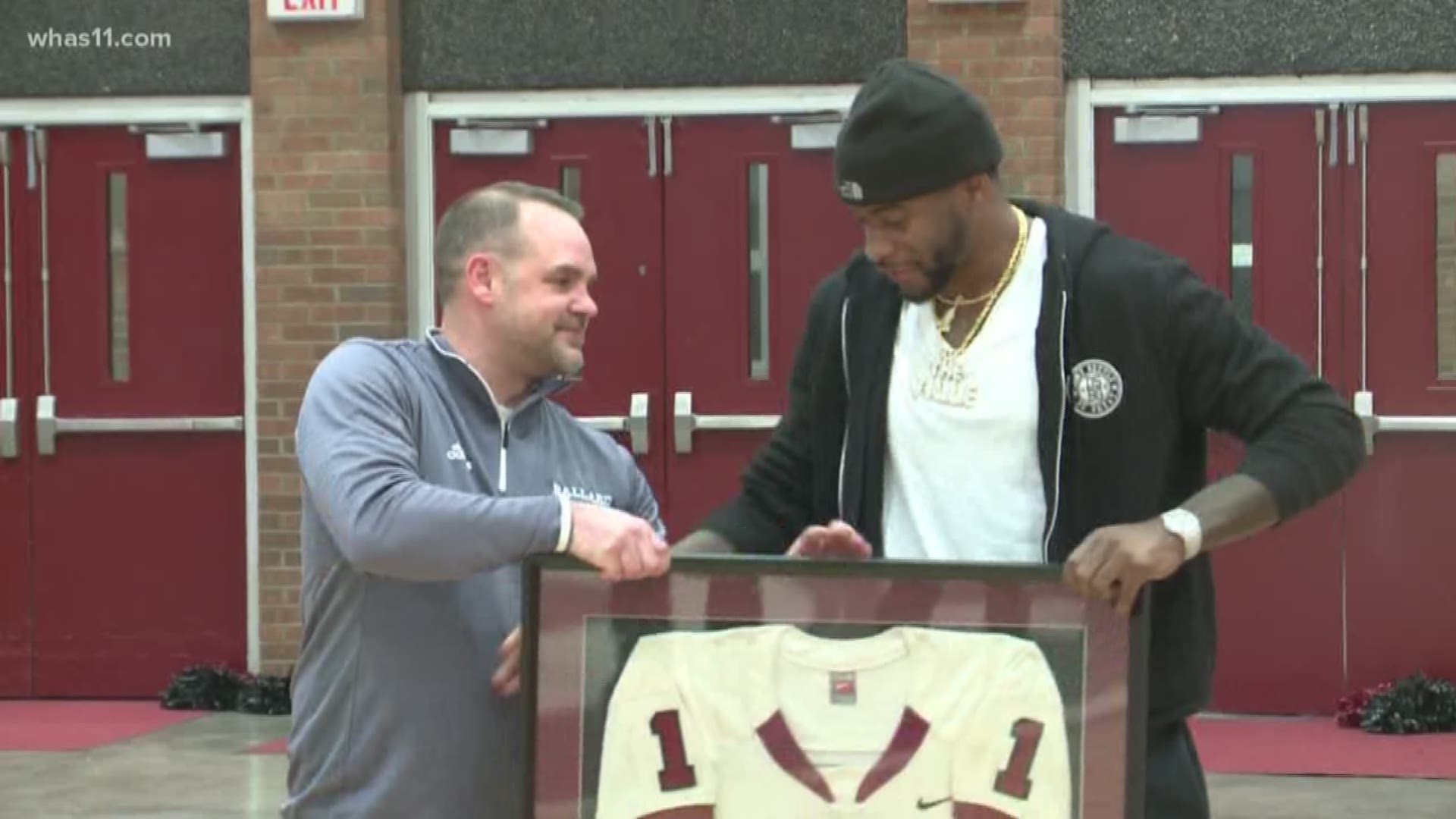 Current Miami Dolphins wide receiver Devante Parker returned to his high school alma mater to have his basketball jersey retired.