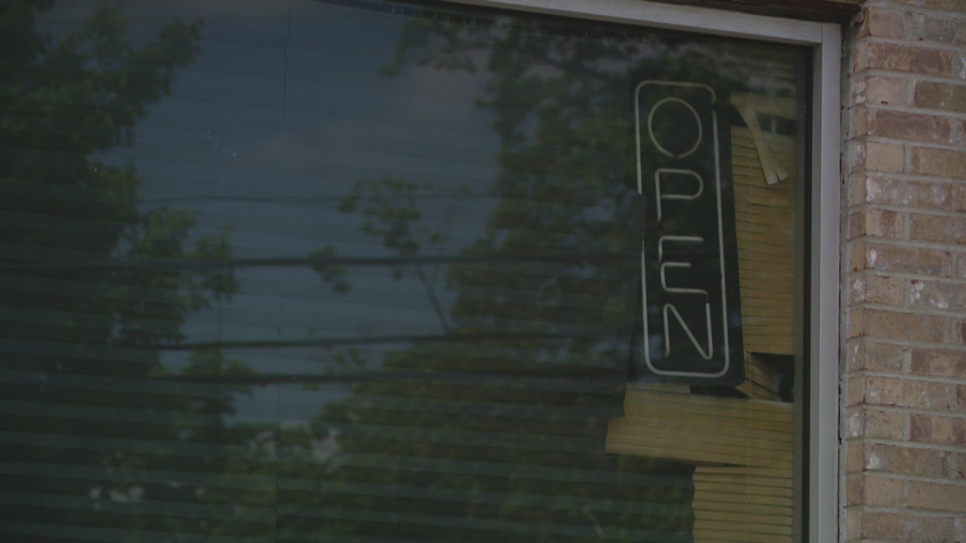 Police investigate woman's death after body found at La Grange business ...