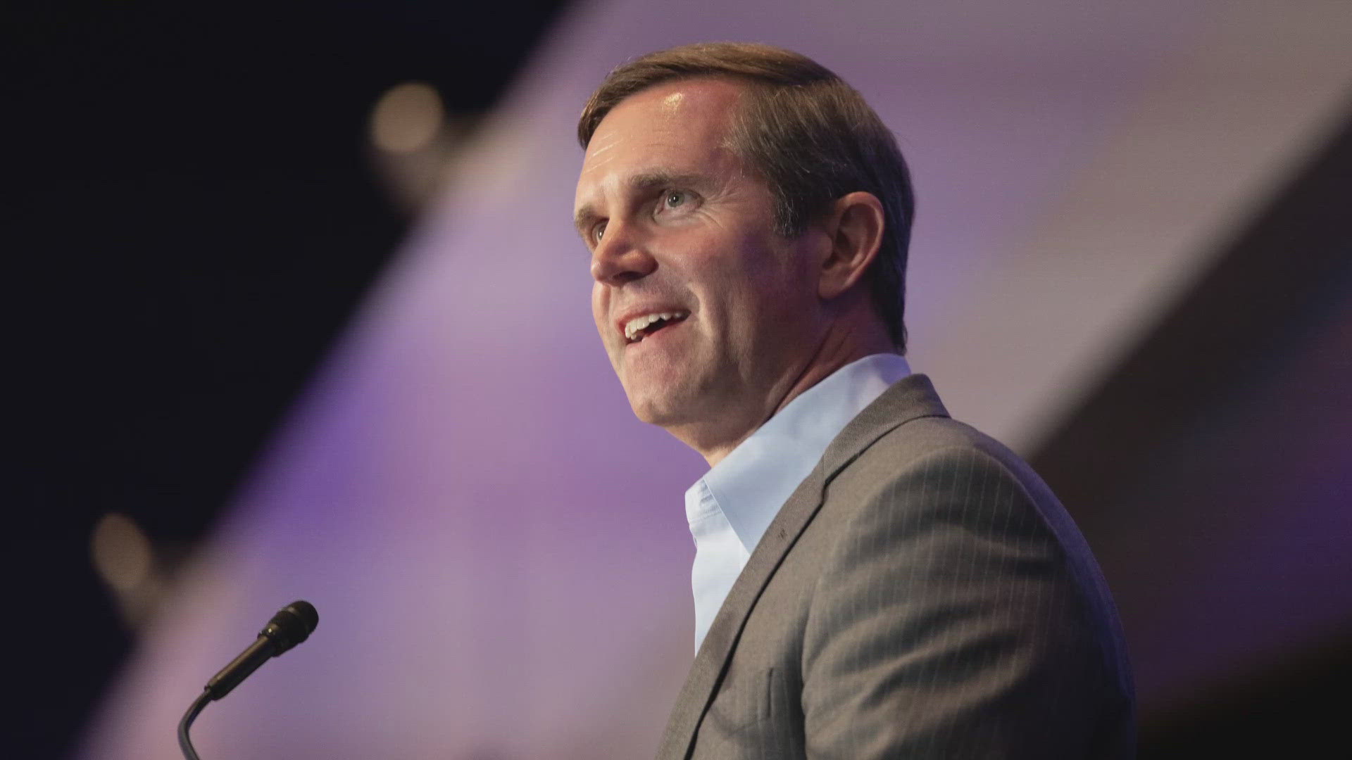 Governor Andy Beshear knew when talking to a sold out crowd of people outside Kentucky, he needed to start with a message they could recognize.