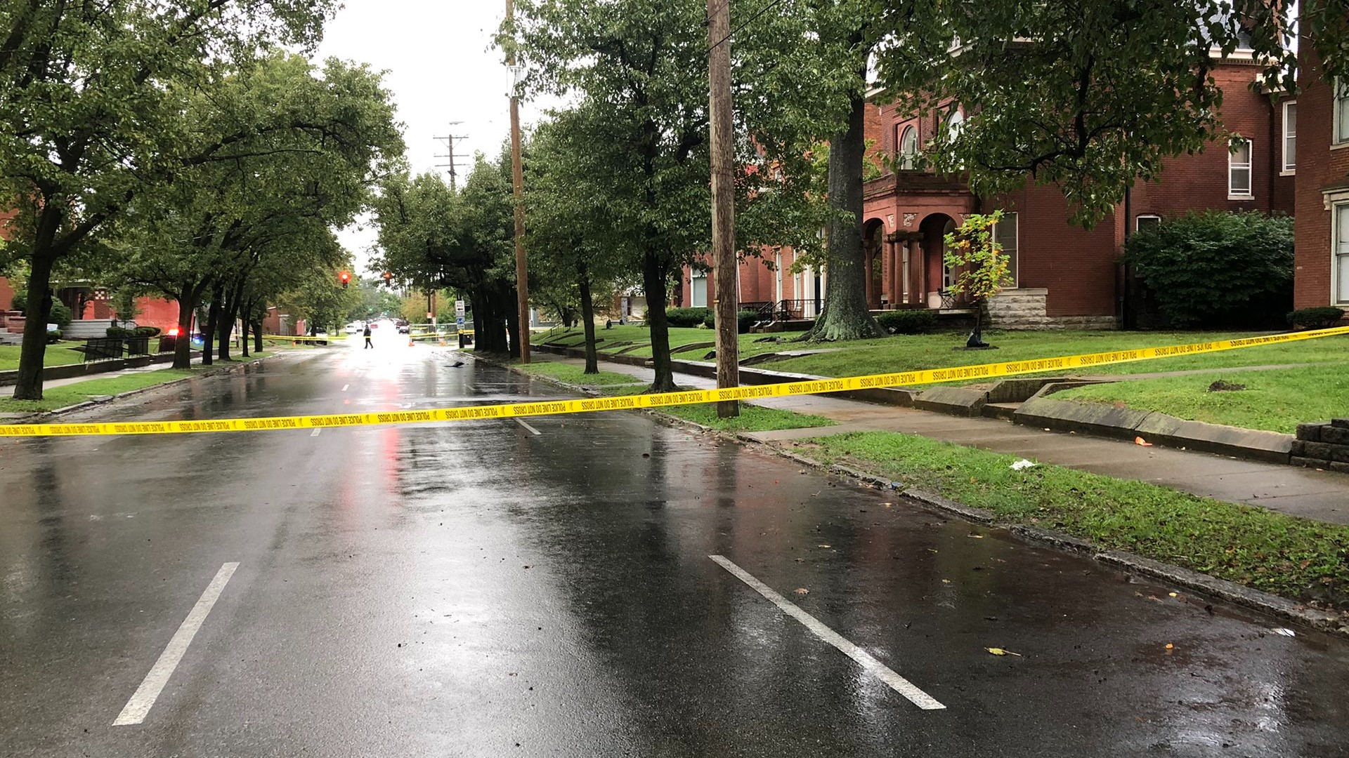 At least one student was killed after someone in a vehicle shot into a group waiting at a bus stop in the Russell neighborhood early Wednesday morning.