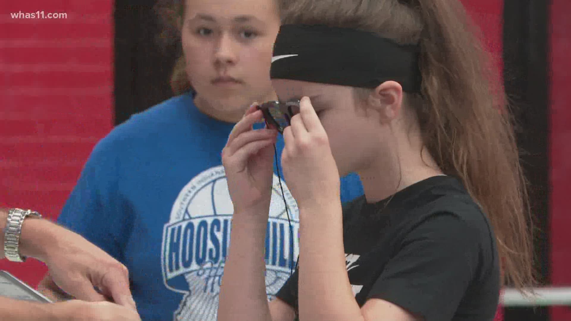 In addition to getting kids back on the court, the summer camp tests young athletes' eyes and follows up with them about their vision.