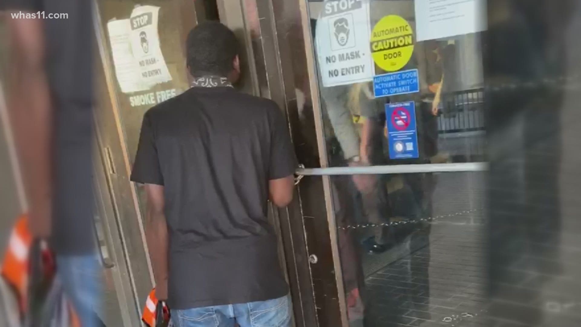 A Louisville man is suing the Jefferson County Sheriff’s Office after a deputy was caught on camera pepper spraying him through the courthouse doors on July 10.