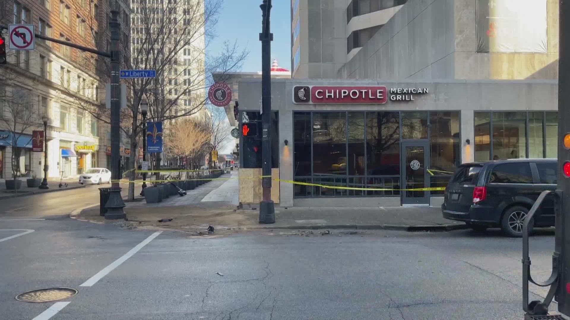 Louisville Metro Police said the damage was from an incident involving two cars on Liberty Street.