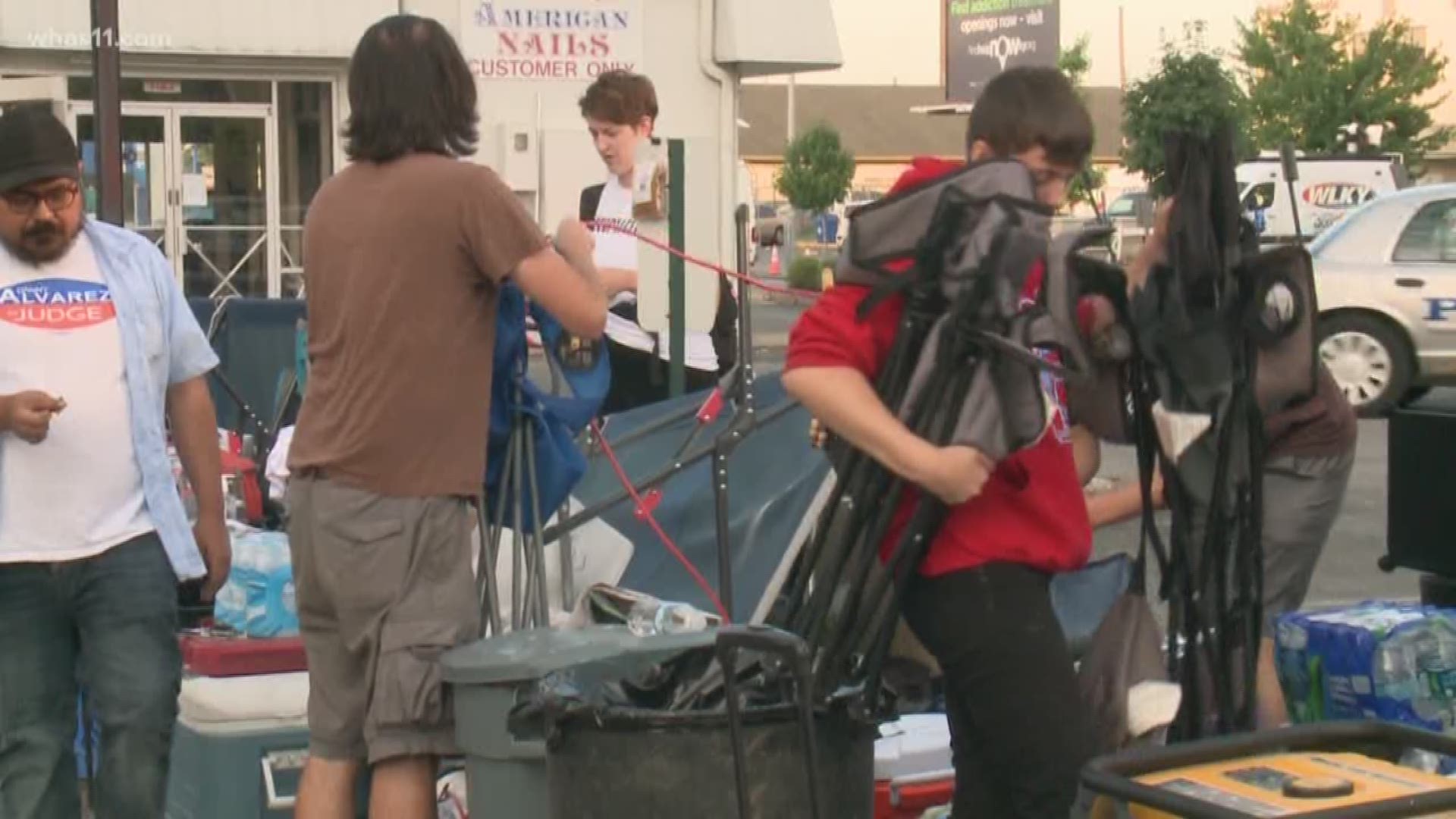 Louisville Metro Police showed up on July 19 to move tents and set up barricades at the Occupy ICE protest in downtown.