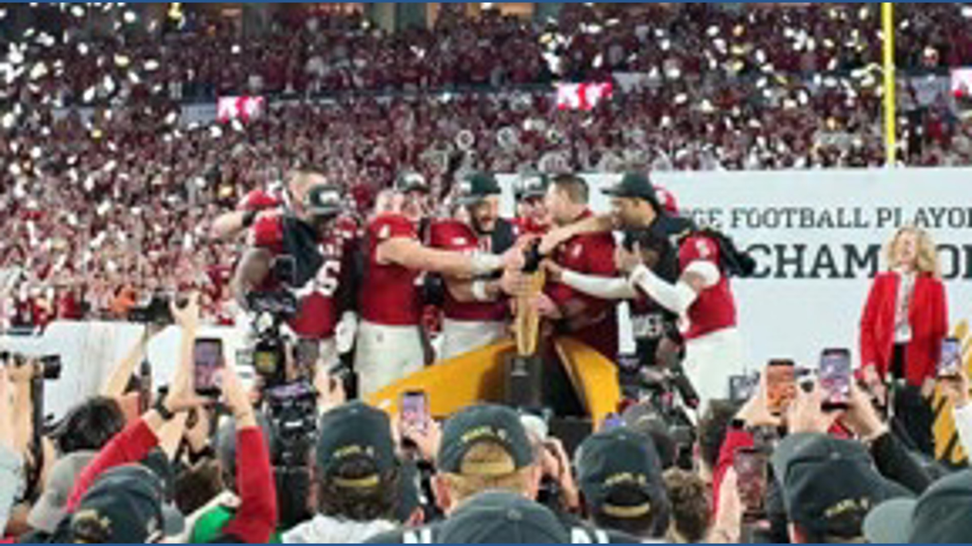 Watch Indiana lift up the National Championship Trophy | whas11.com