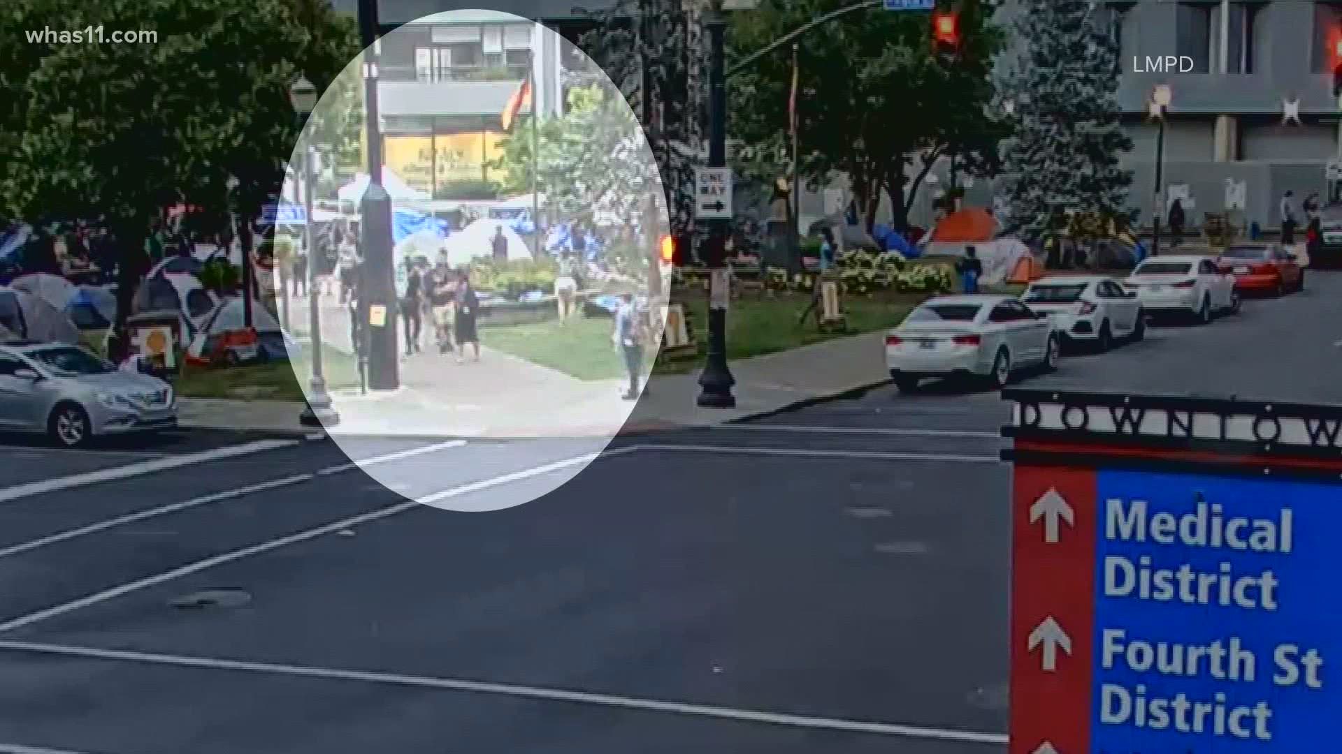 LMPD released video showing suspect Steven Lopez pull a weapon from a man in Jefferson Square Park. Moments later, Lopez is seen shooting into the crowd.