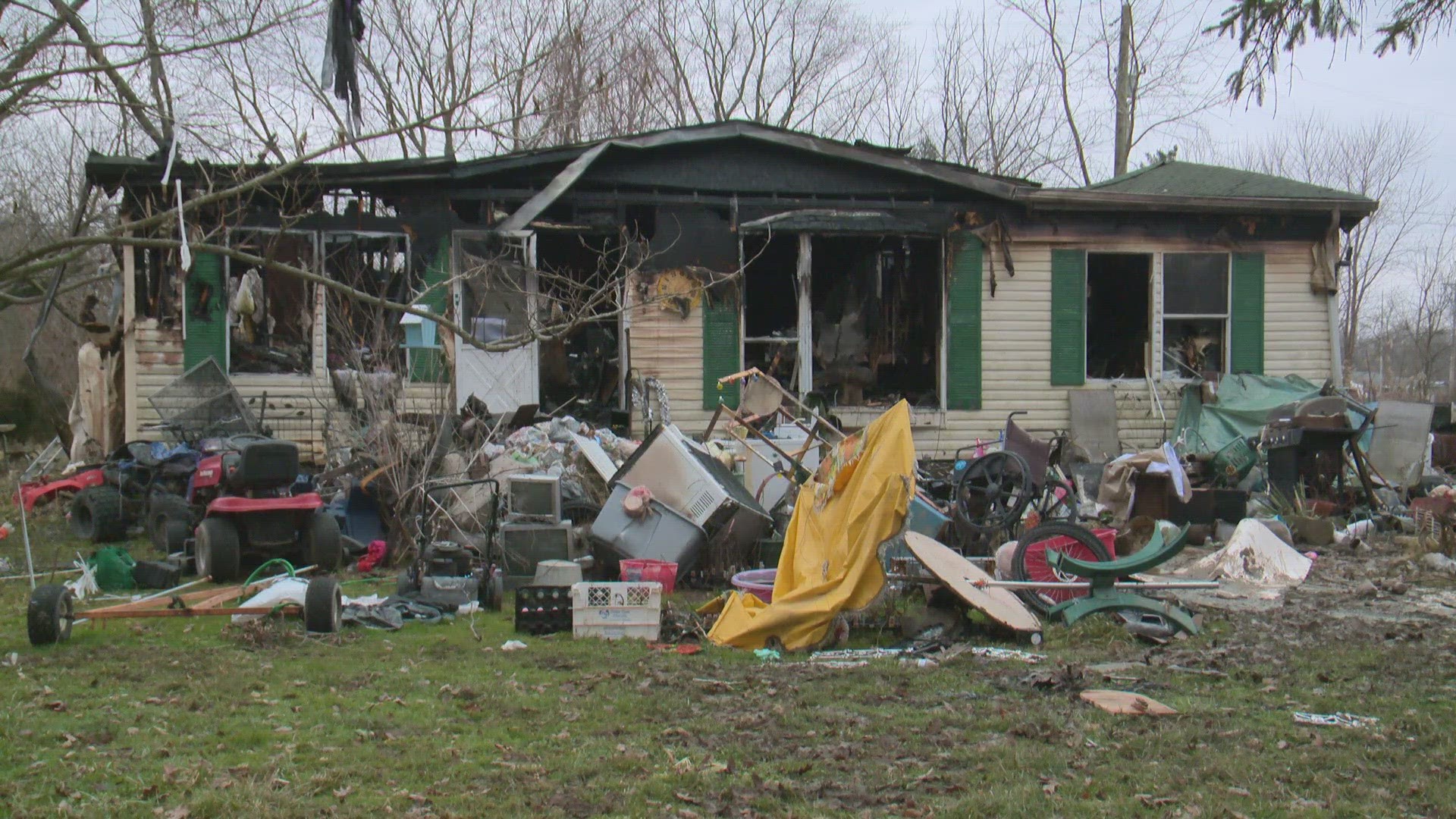 The victim's wife said the fire started after a candle fell into a trash can.