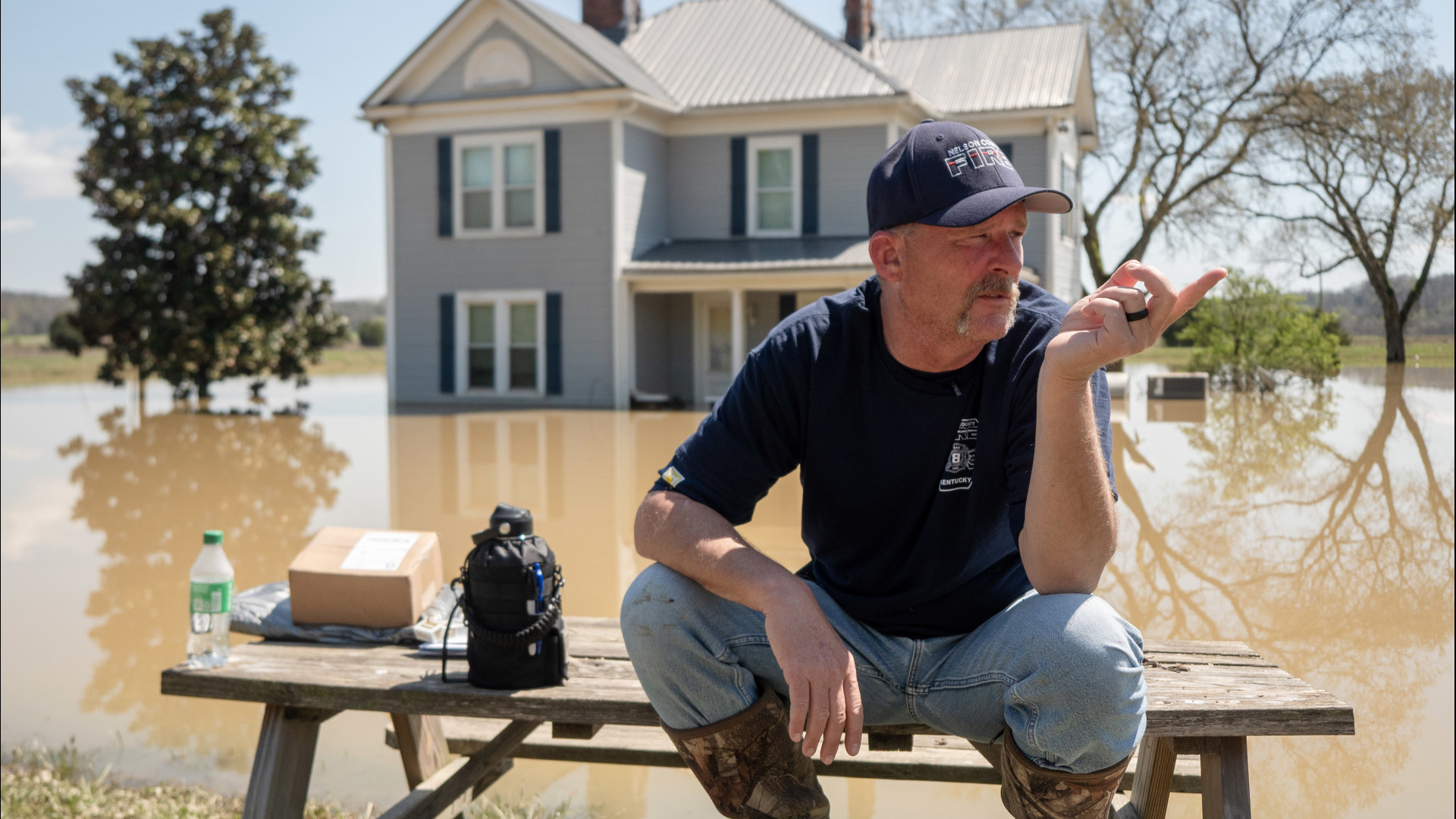 The Nelson County firefighter had to be rescued himself and then spent days rescuing his neighbors.