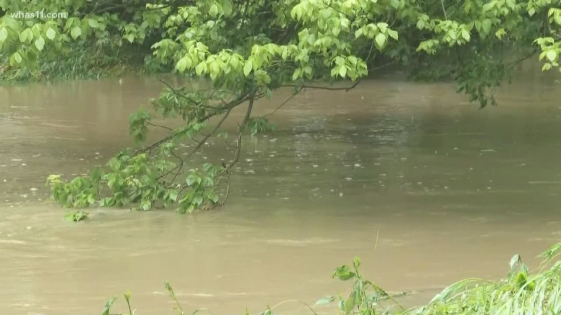 A family had just finished a Father's Day celebration Sunday when they tried to drive across a flooded bridge and became trapped.