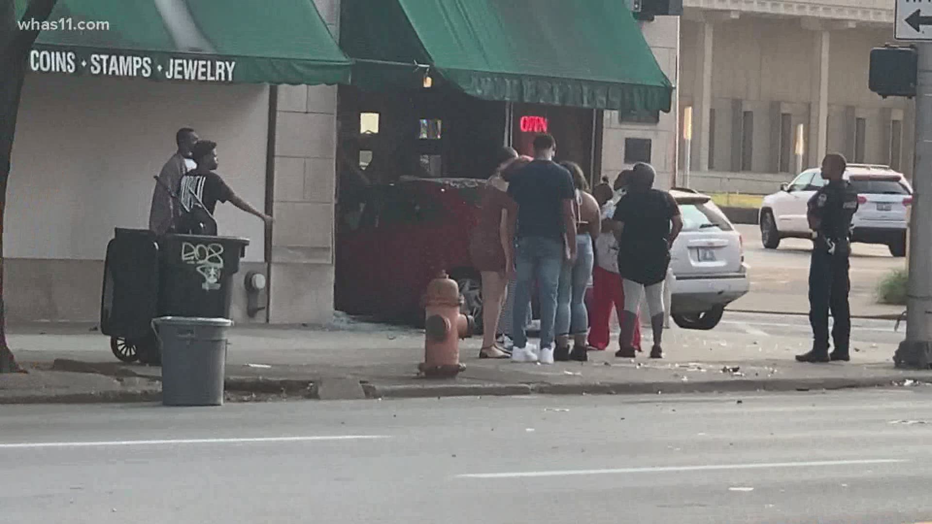 The fire department had to pull the car out of the building before it could be towed away.