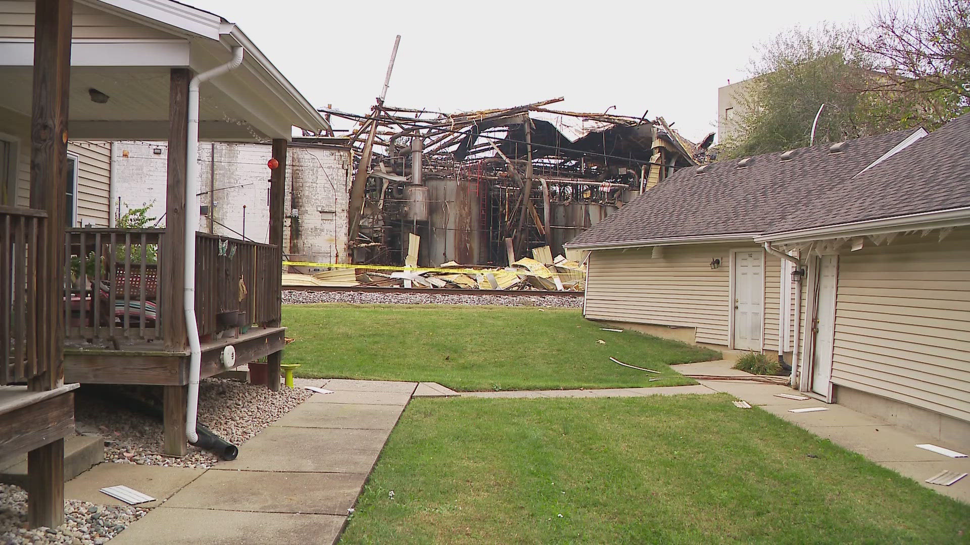 The aftermath of a factory explosion in Louisville has left debris and damage in many neighbors' yards.