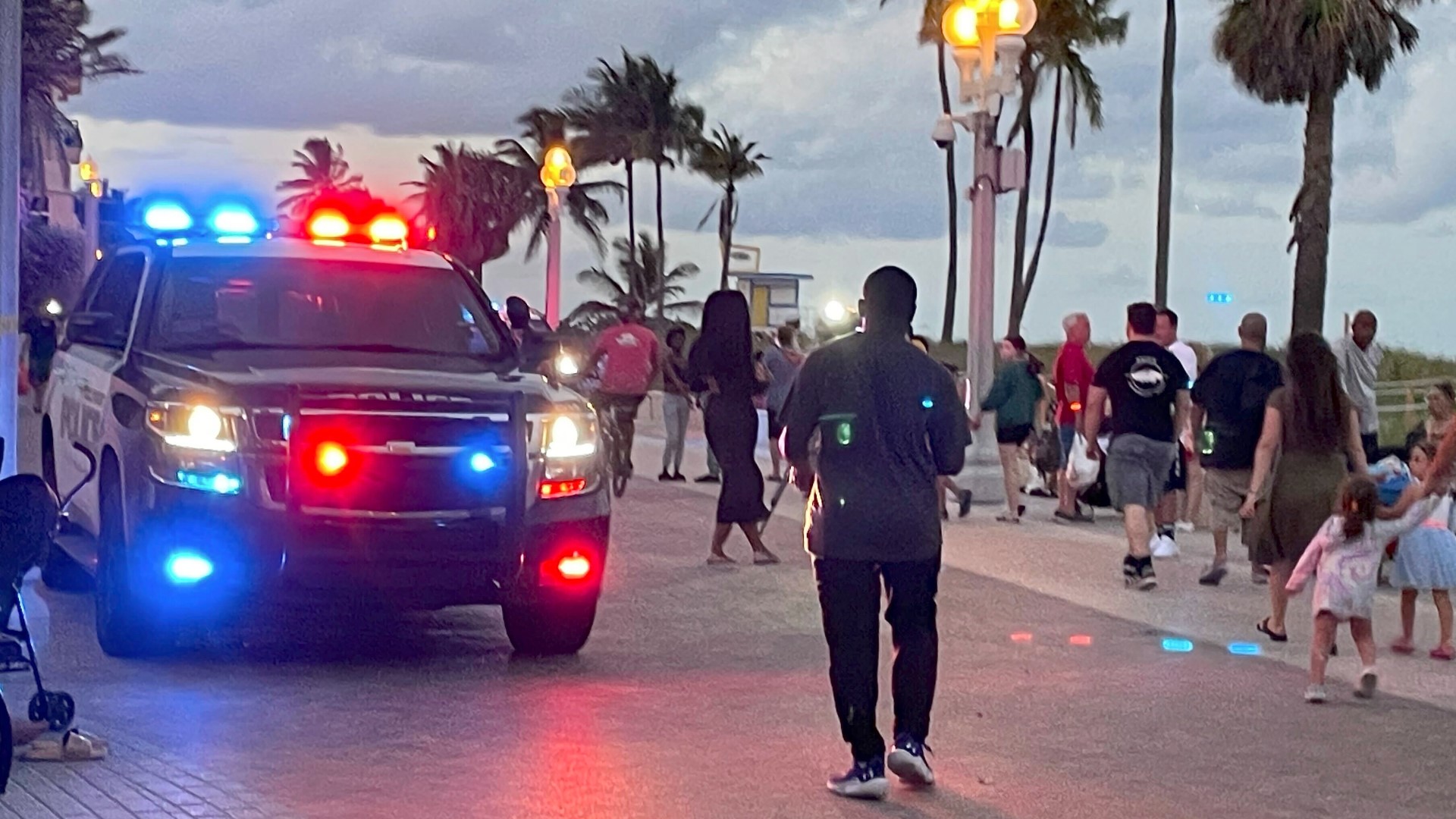 An altercation between two groups led to the gunfire that sent people running for cover along the crowded beach on Memorial Day, police said.