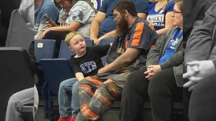 Viral photo shows coal miner at basketball game with son