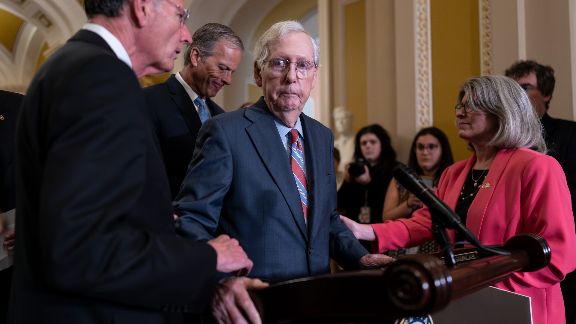 McConnell approached the podium for his weekly press conference and began speaking about the annual defense bill on the floor.