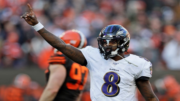 Ravens win 11th straight, clinch top seed in AFC playoffs