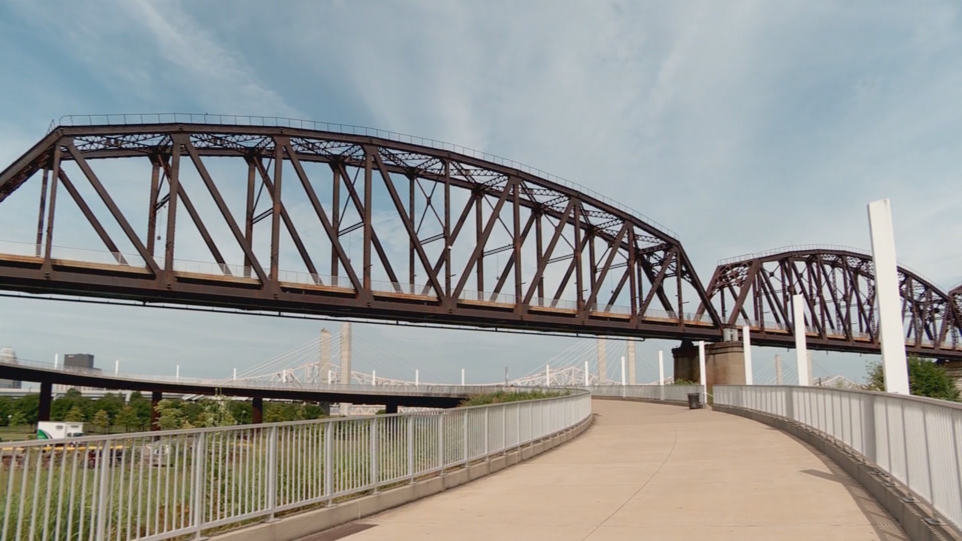 It takes about 15 minutes to walk the Big Four Bridge to get between Indiana and Kentucky. When it comes to the coronavirus pandemic, the similarities are timeless.