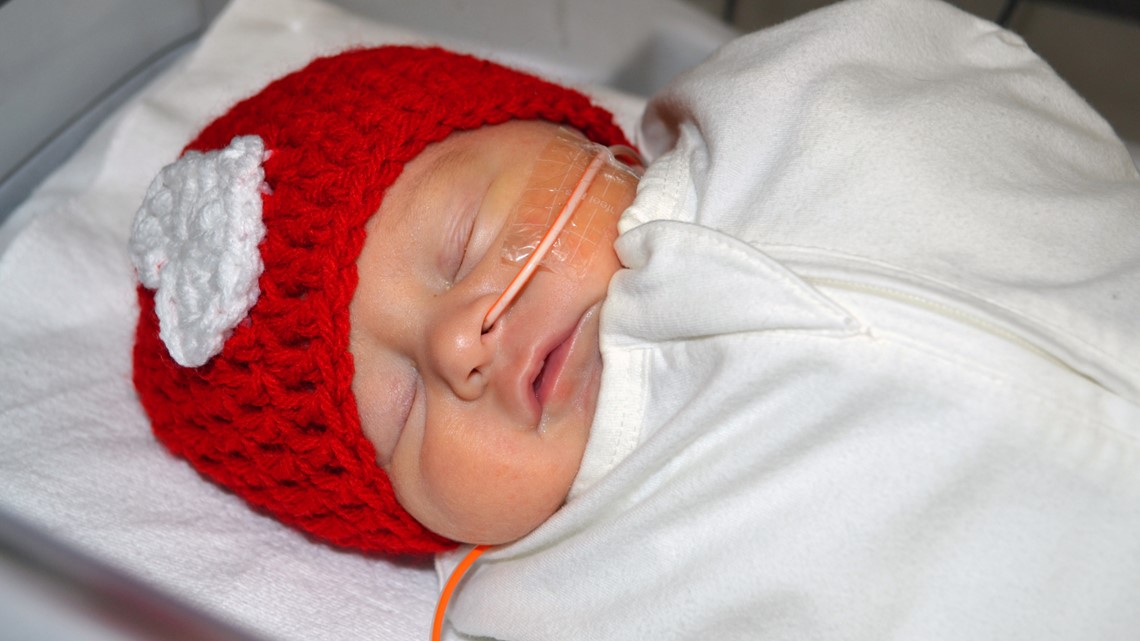 Newborns at Baptist Health Louisville receive red hats in honor of