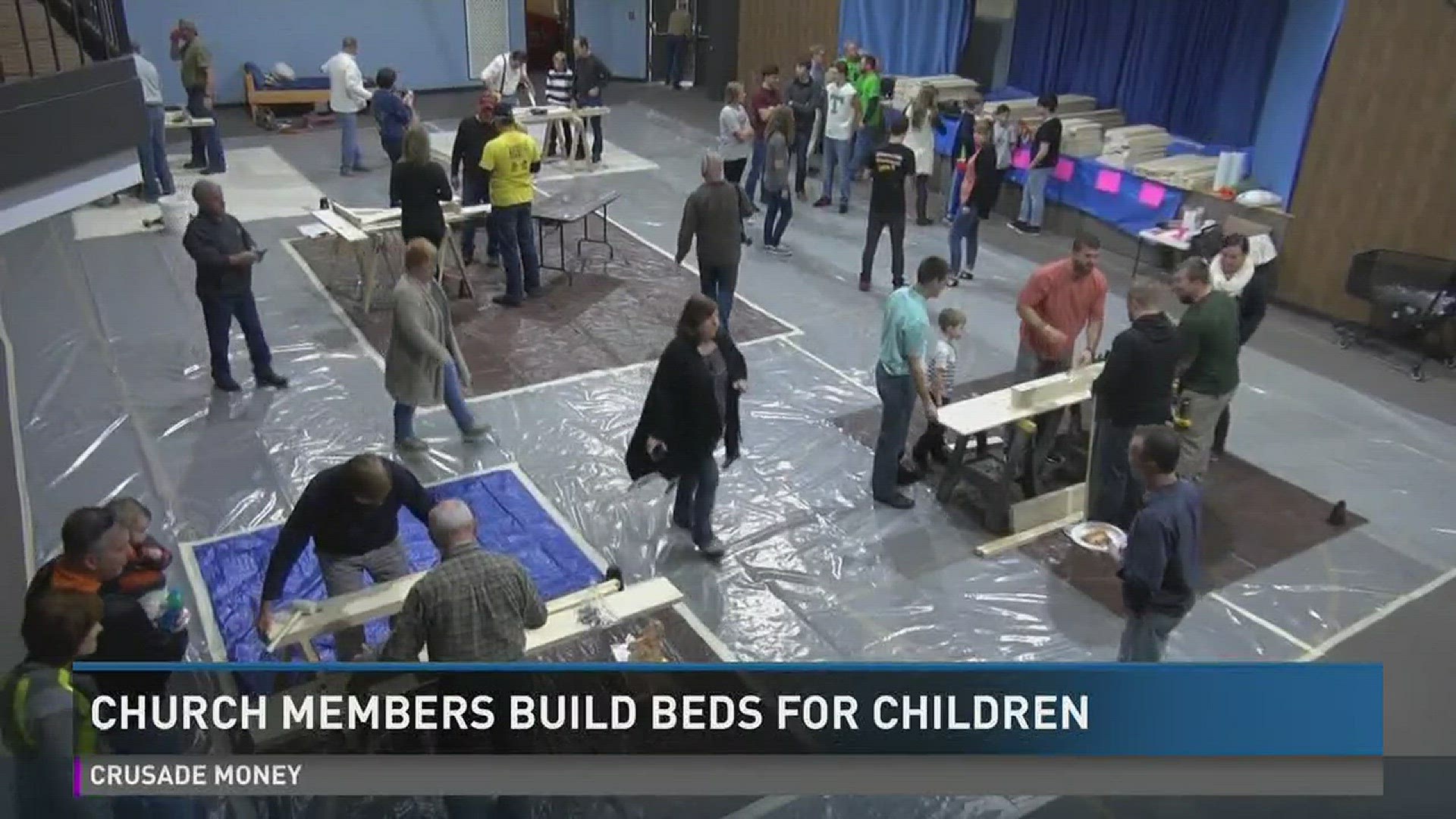 Church members build beds for children